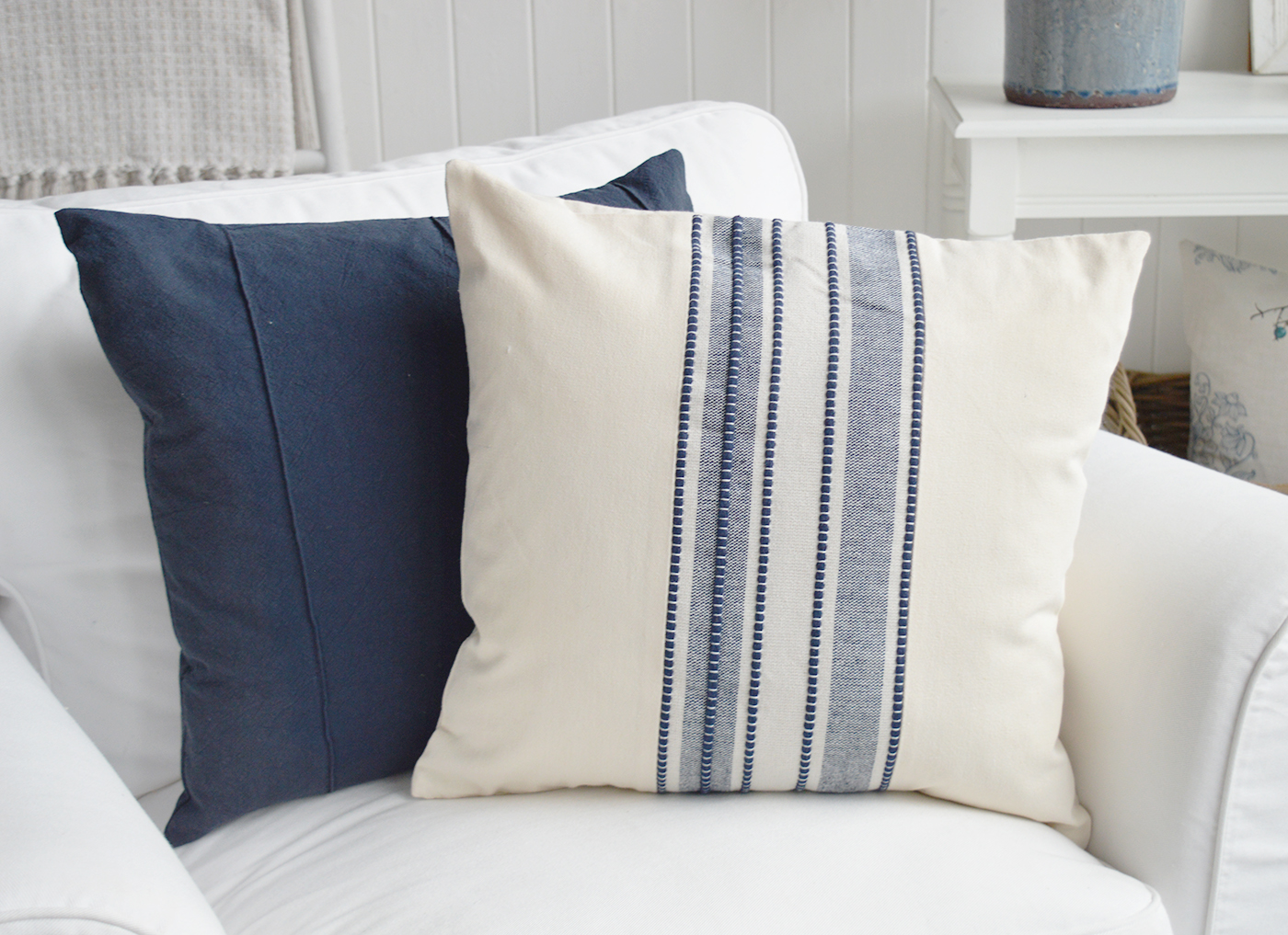 The Chadwick navy blue cushion cover brings timeless New England style to coastal living rooms and bedrooms.