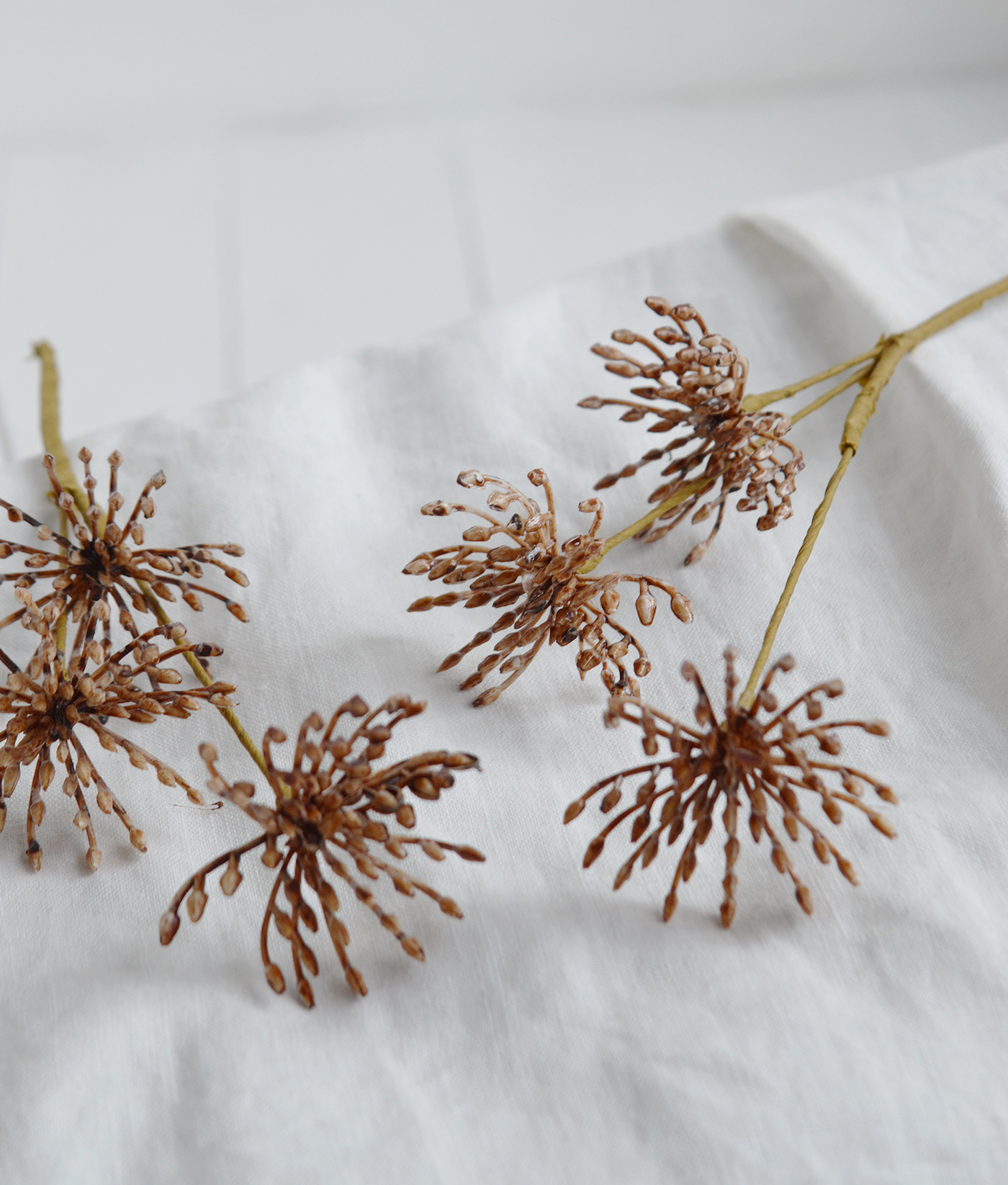 Rustic New England tray styling with faux botanicals and natural textures