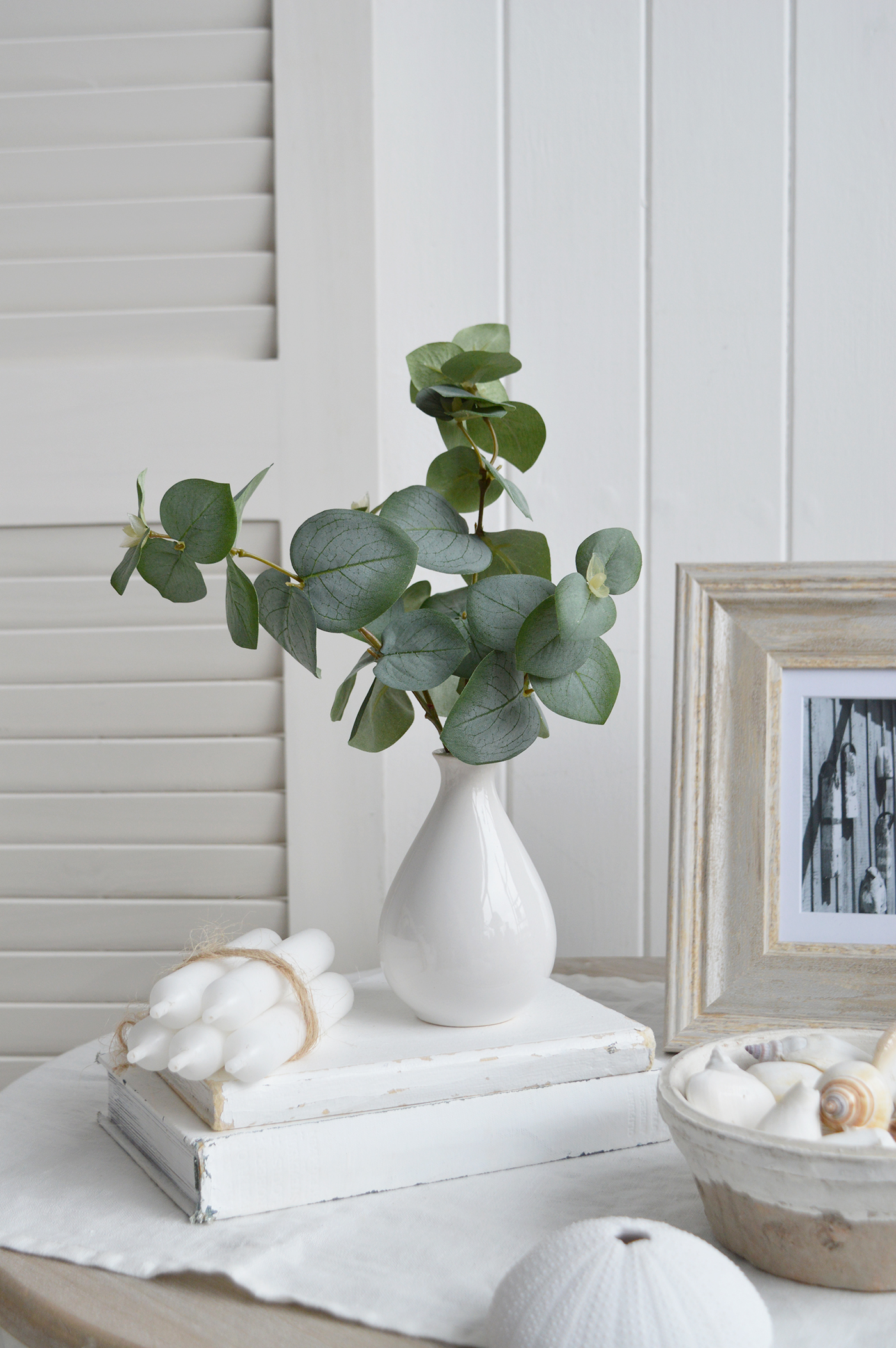 Faux Eucalyptus stems in a White Ceramic Vase - Hamptons and New England Coastal Homes and Interiors