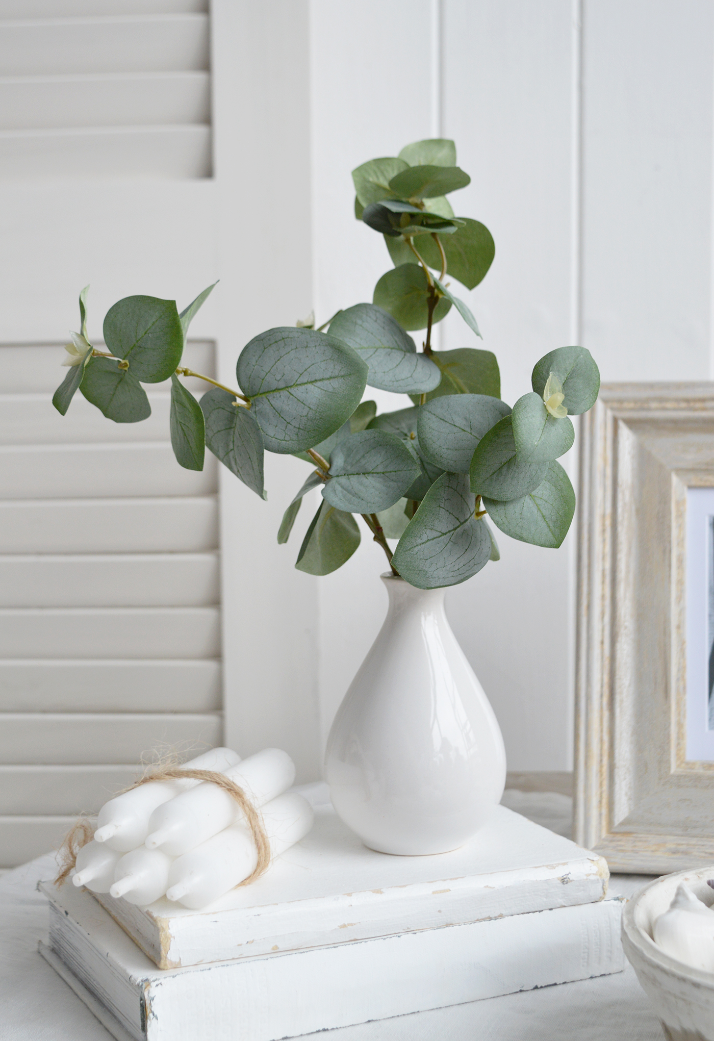 Faux Eucalyptus stems in a White Ceramic Vase - Hamptons and New England Coastal Homes and Interiors