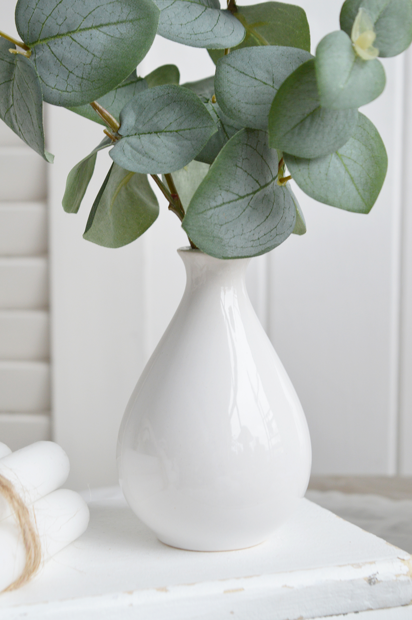 Faux Eucalyptus stems in a White Ceramic Vase - Hamptons and New England Coastal Homes and Interiors