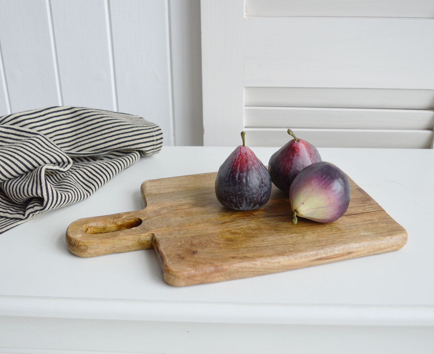 The Grafton Mango Wooden Boards capture the essence of relaxed New England living through their natural, rustic charm.