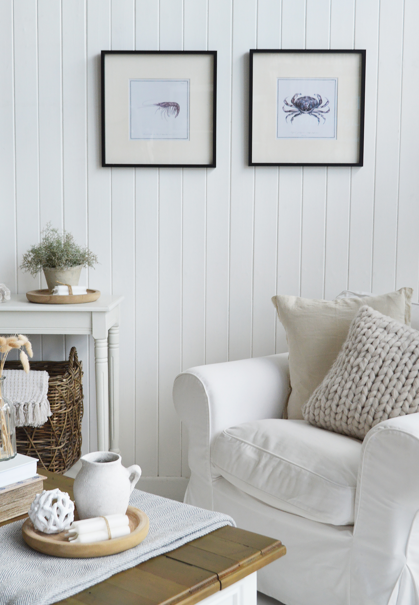 White coastal styled living room showing the Hamptons wall decor