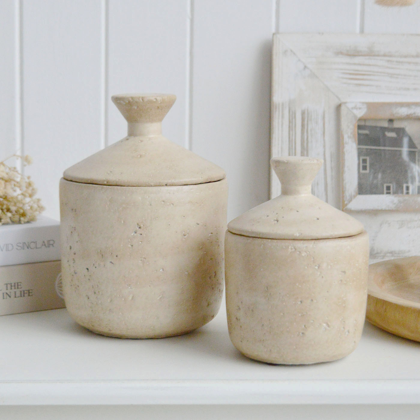 	These Hearthstone jars in warm limestone bring a soft, natural texture to shelves, consoles and coffee tables, perfectly suited to New England coastal interiors, neutral home décor and relaxed modern farmhouse styling.