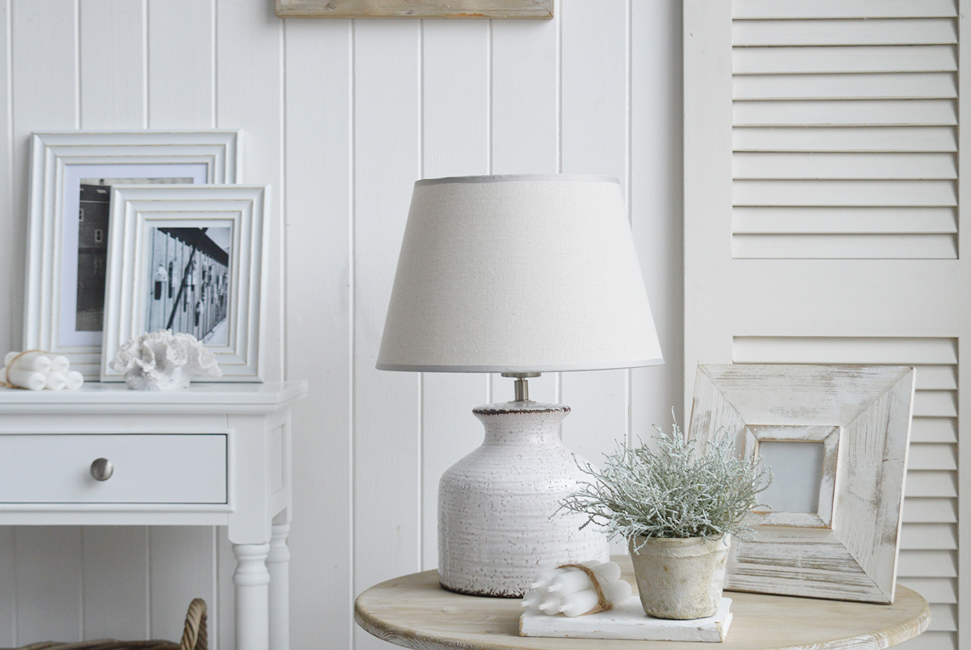 The White Compton white ceramic lamp with a glazed finish for modern farmhouse interiors in UK