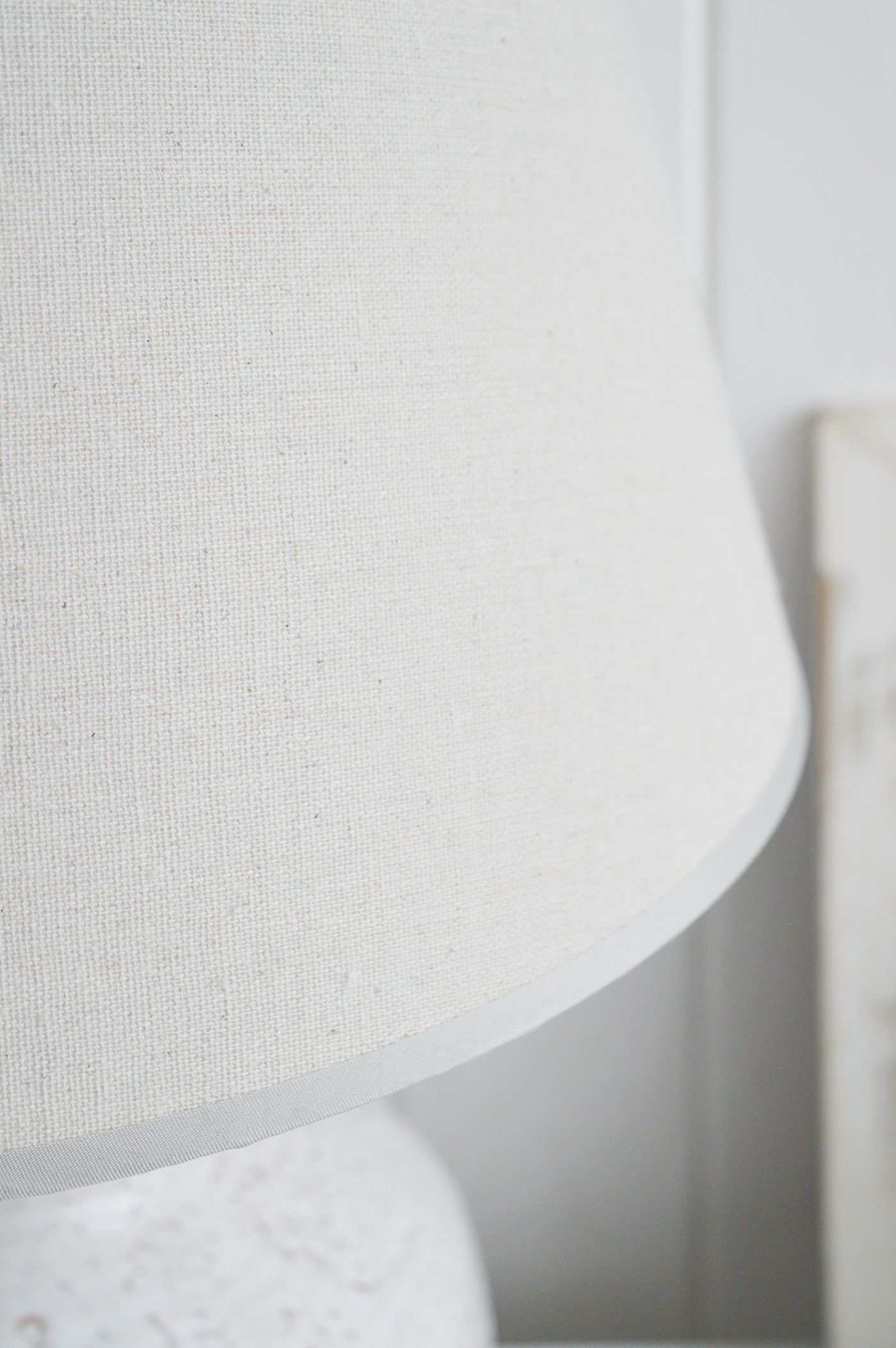 The White Compton white ceramic lamp with a glazed finish for for white interiors