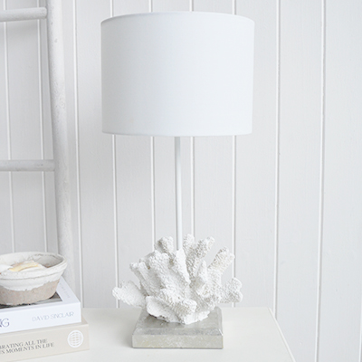 Perfect for console tables, bedside tables and sideboards, this coastal table lamp brings warmth to white interiors.