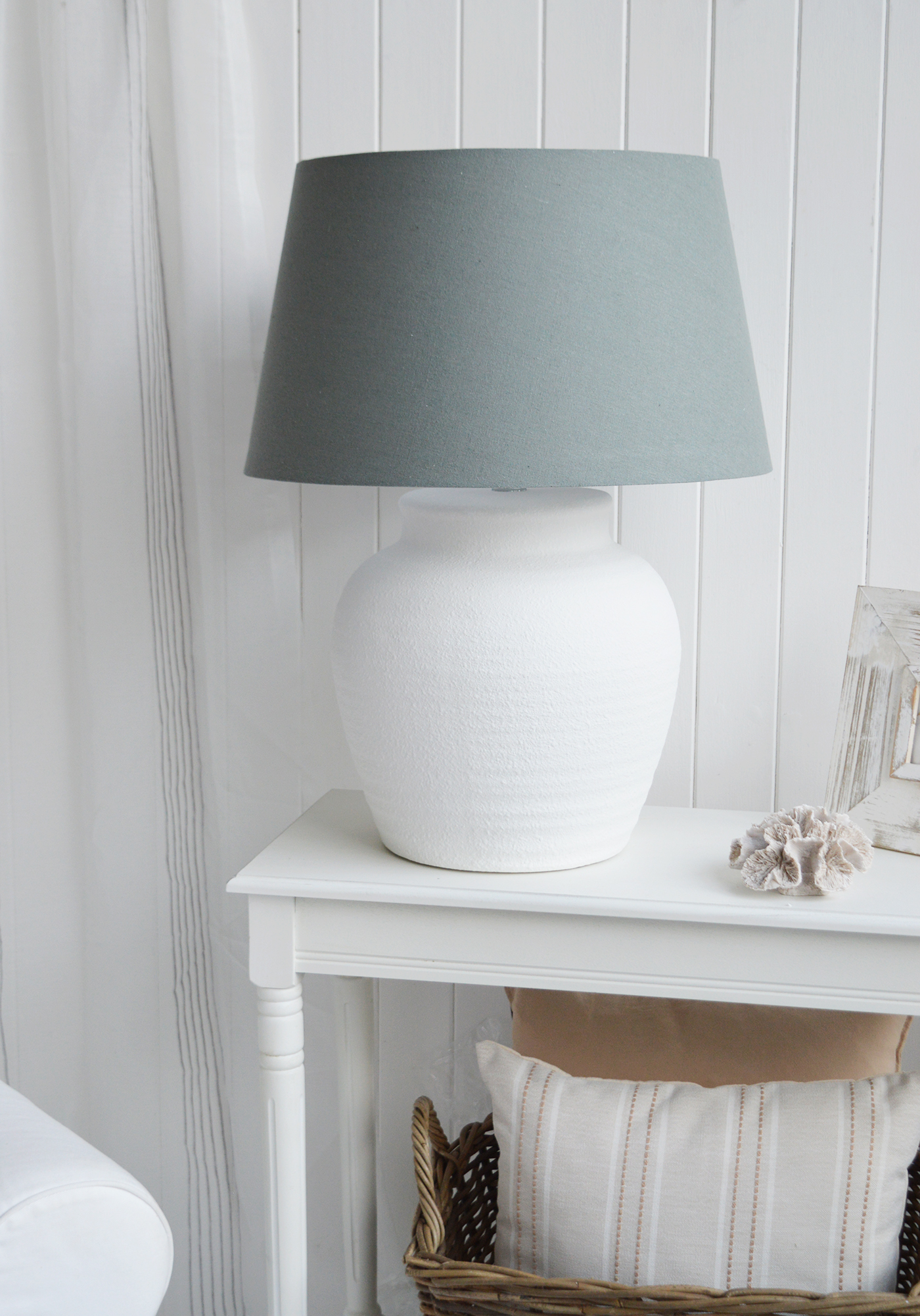 The Putney Stone White Lamp is the perfect table lamp for creating a warm and inviting coastal interior with timeless style.