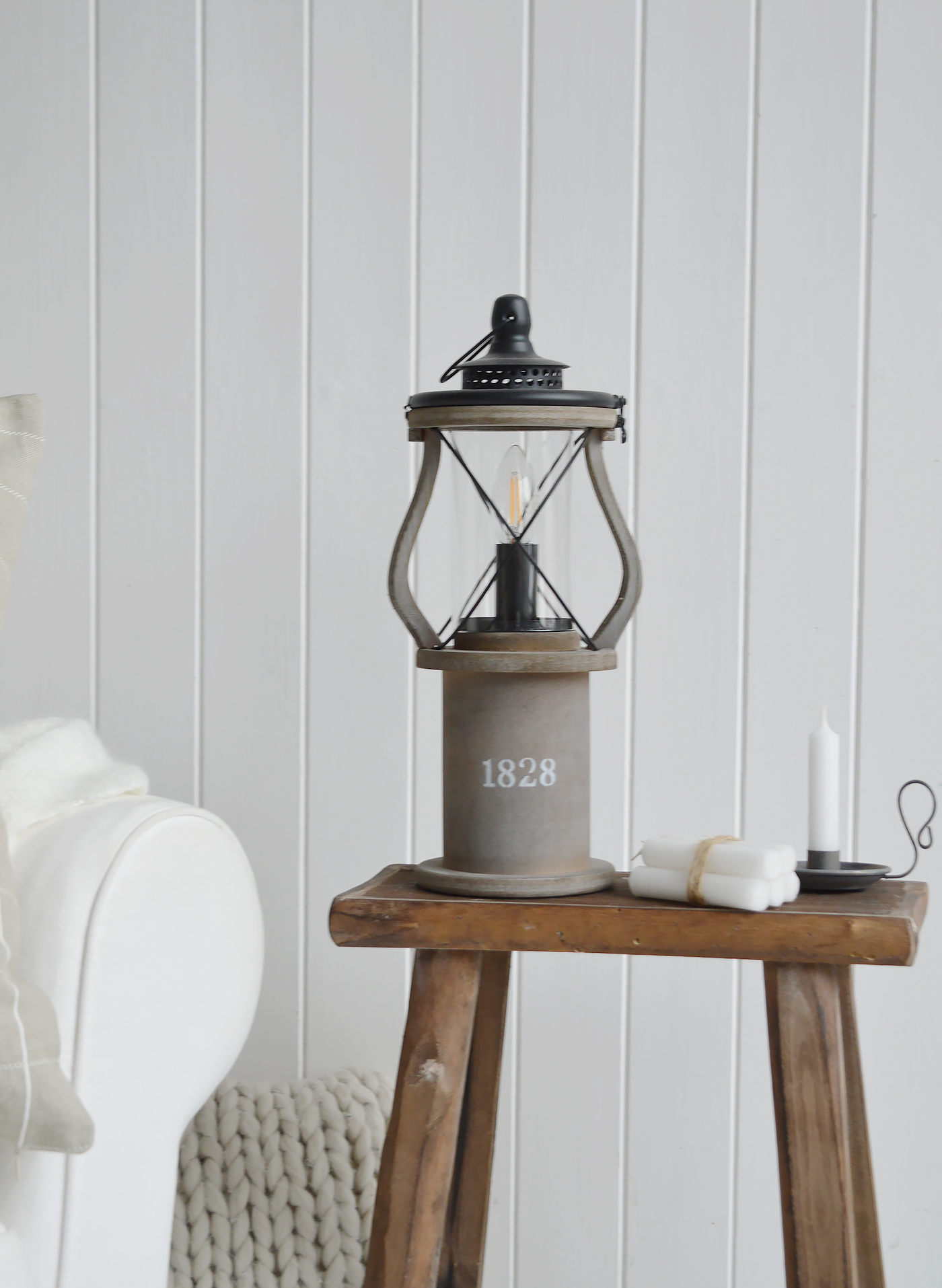 The Lewiston lamp on the Georgetown stool table in a beach house coastal inspired room