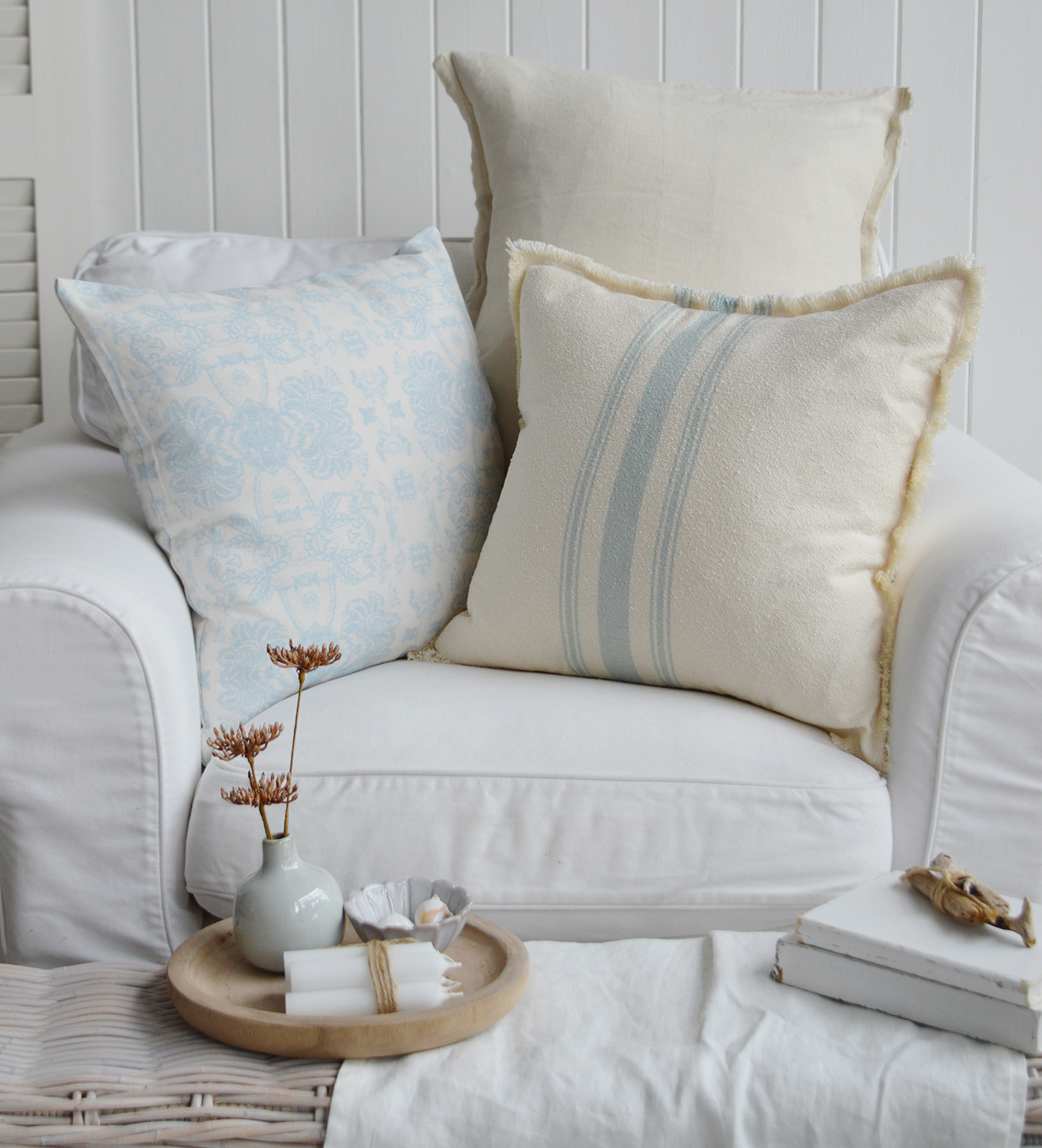 Soft textured throw anf Lexington cushion with coastal cushions in beach decor