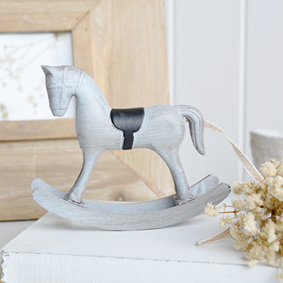 The understated design of this grey rocking horse makes it easy to layer with books, frames and soft furnishings in relaxed interiors.