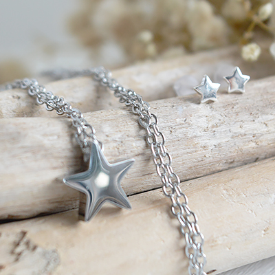This delicate silver star necklace reflects the calm, effortless style of The White Lighthouse New England way of living.