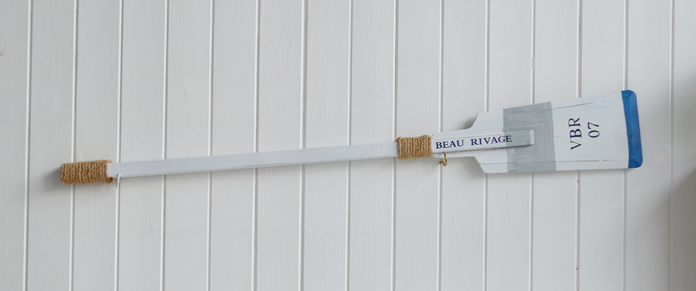 Blue and white decorative wooden boat oar paddle for coastal décor