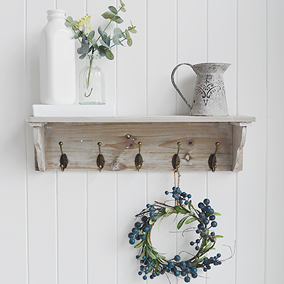 The Pawtucket grey wood wall rack is a shelf with of 5 hooks ideal for hanging coats, towels etc or purely for decorative purposes to add interest to an empty wall for New England interiors for all coastal and country homes