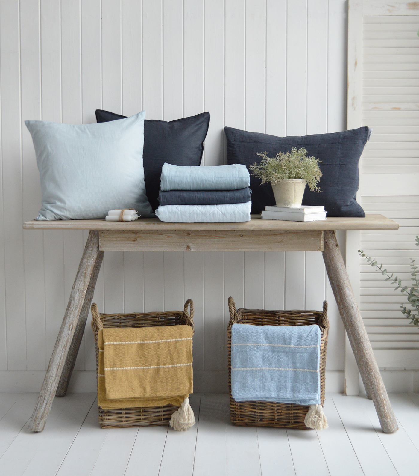 Refresh your space with the calming tones of sky blue, midnight blue, and classic stripes.

