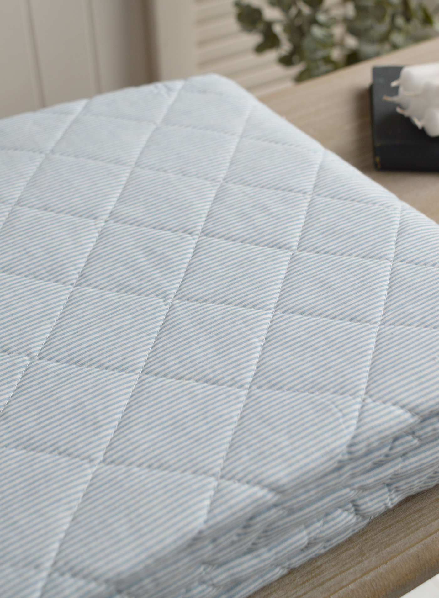 Light and airy, the sky blue cushions and quilts brighten up your home with subtle sophistication.