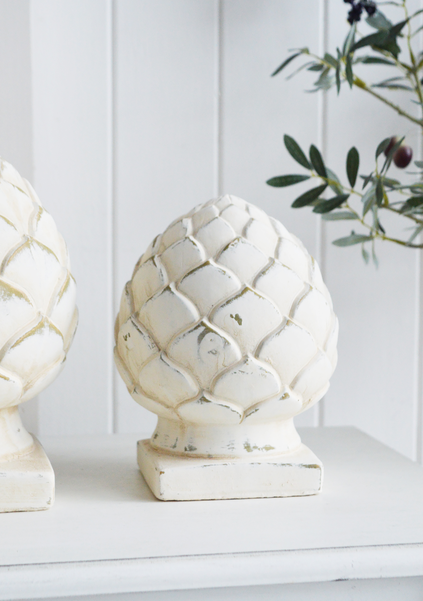 Standing Pinecones in aged cream stone