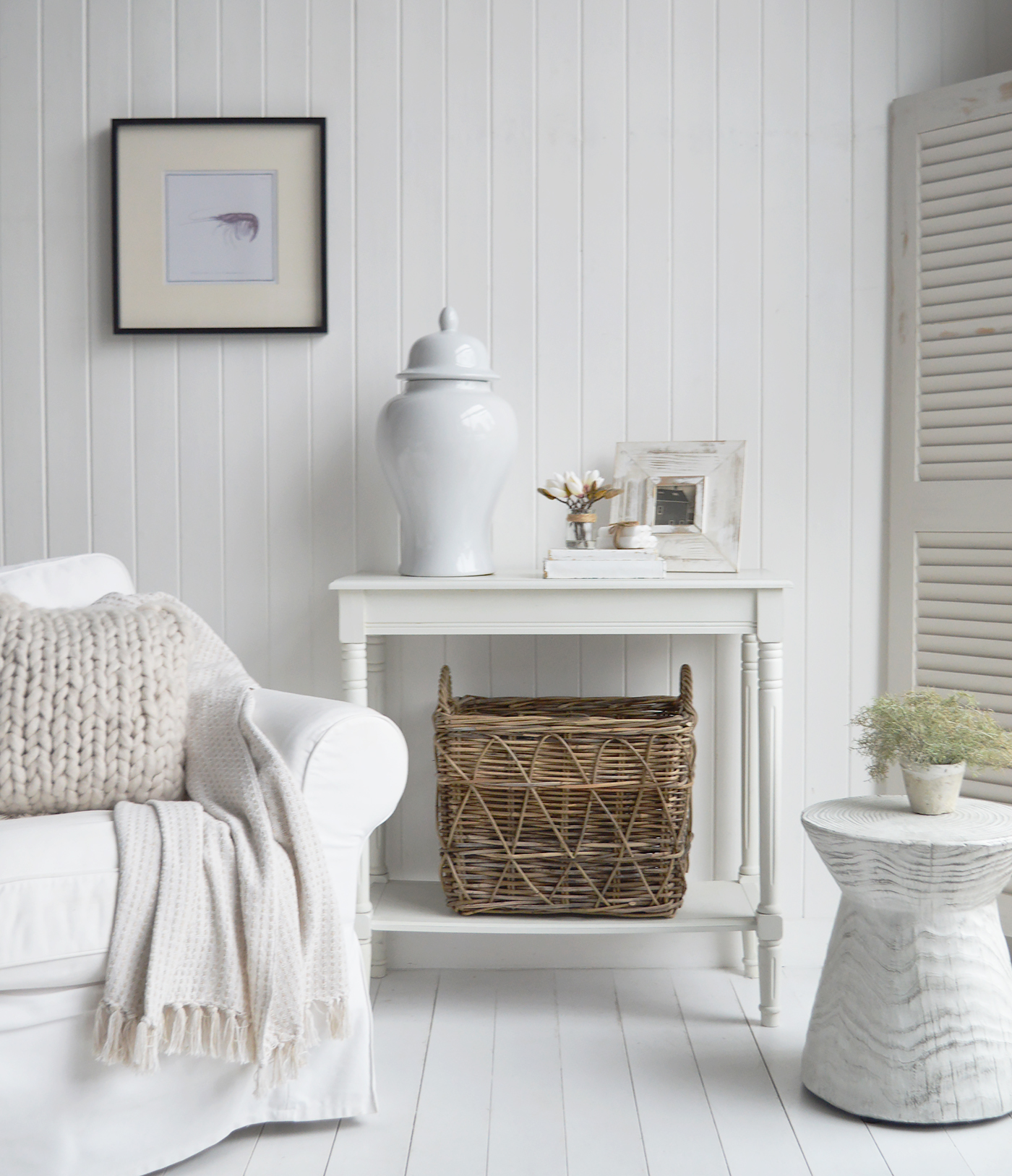 With its smooth curves and glossy glaze, the Porter Jar adds refined charm to a console, side table, or shelf.