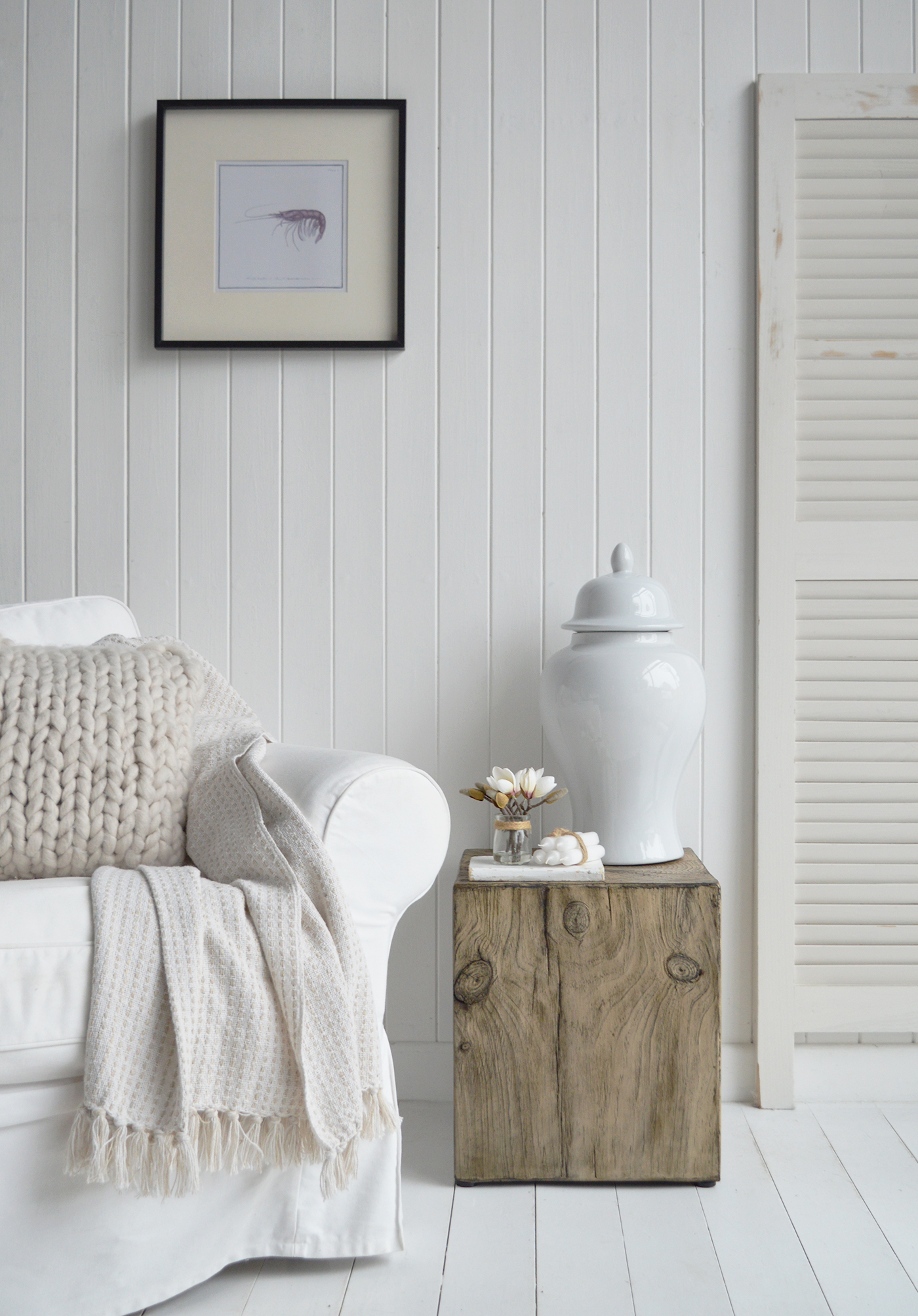 The glossy white finish of the Porter Jar catches the light beautifully, bringing a sense of freshness to any room.