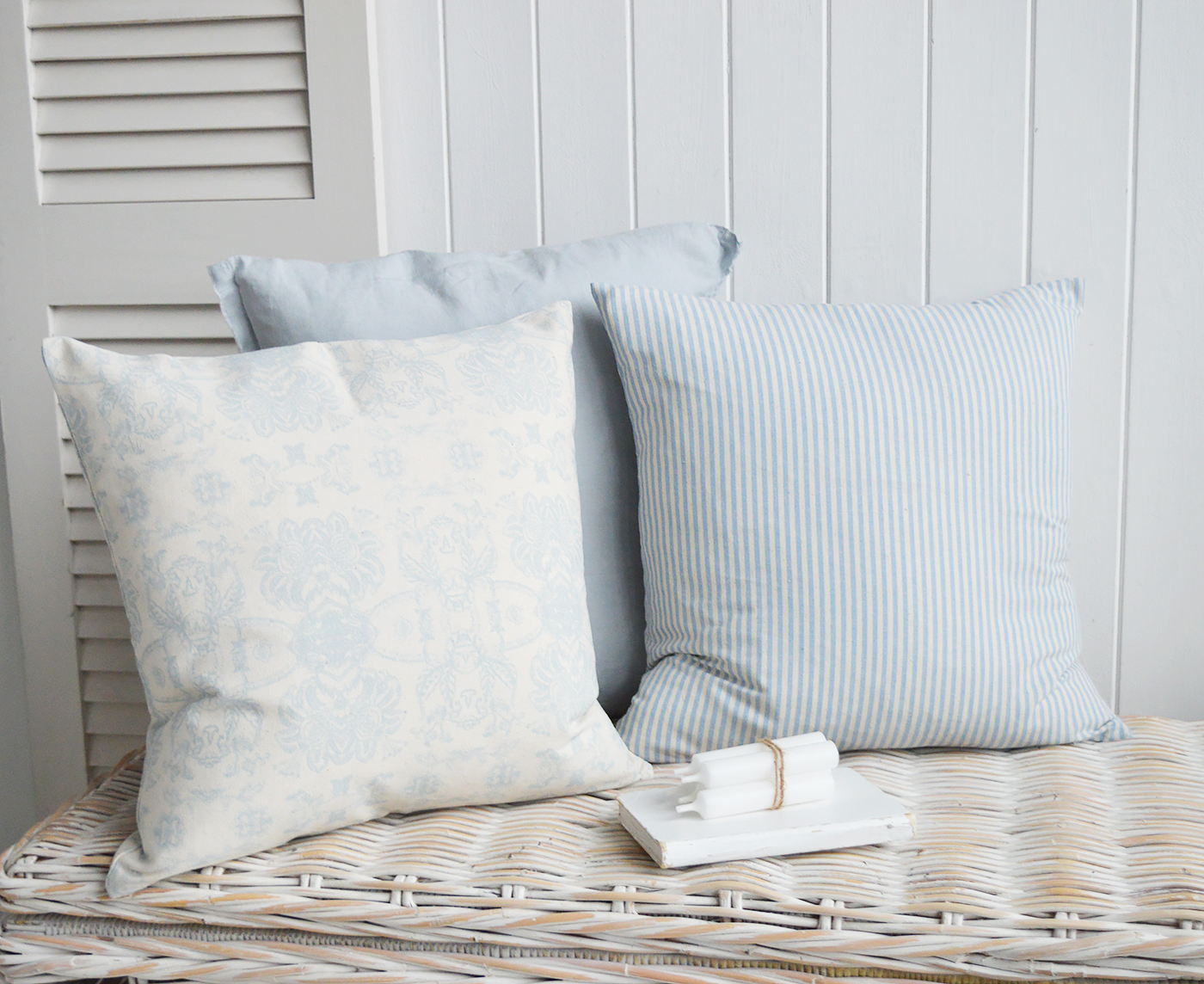 Pale blue pin tripe cushion cover for a coastal vibe