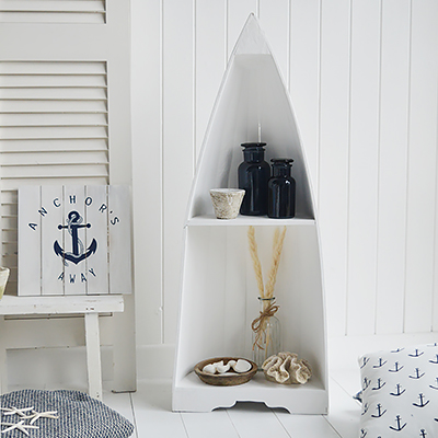 White coastal Boat Shelf with blue accessories for a traditional New England Beach Look