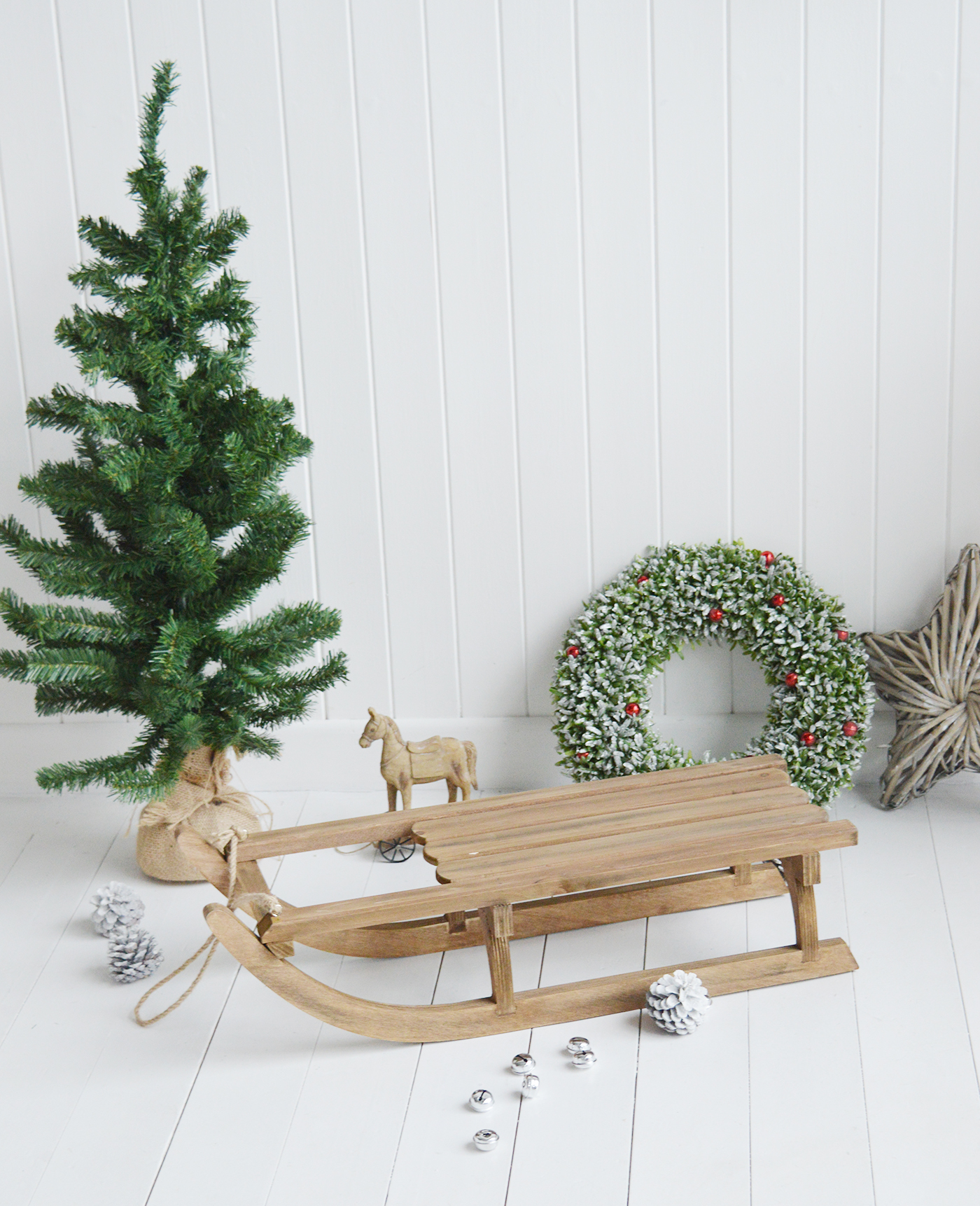 A gorgeous decorative wooden sleigh for elegant Christmas decorations. An absolutely beautiful festive decoration in such a timeless style that will last for many years to come, creating many magical memories from The White Lighthouse Furniture in New England , Country Coastal and City home interiors and furniture