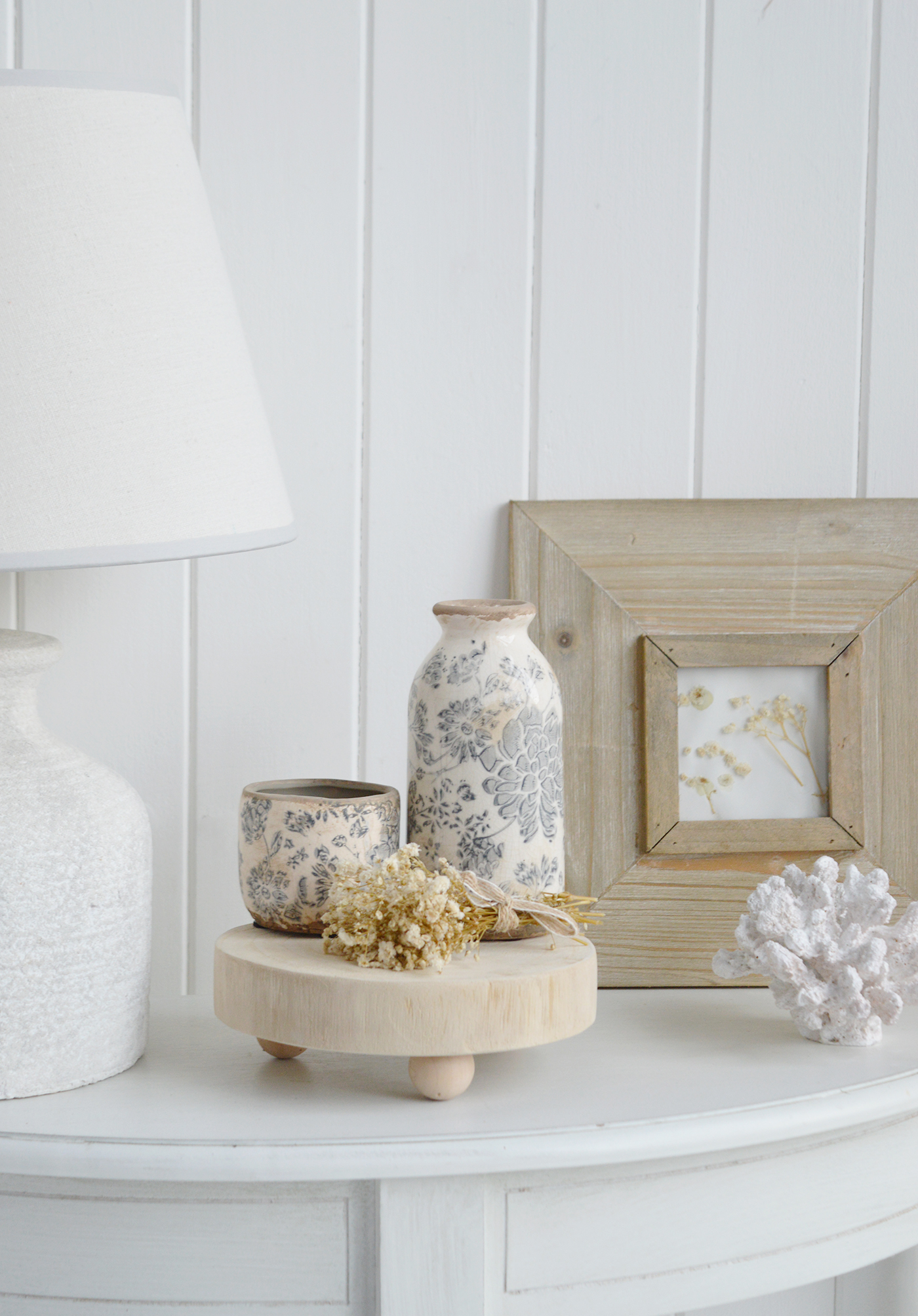 Shop the Willow Cottage four-piece styling bundle, pairing floral ceramics, a wooden stand and decorative flowers for cottage and coastal home décor.