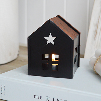 Black Metal Star Tea Light Holder - New England, Coastal and Country Accessories and Furniture for home interiors. This black metal tea light holder is designed like a miniature house, with a cut-out star on the roof that lets light shine through beautifully