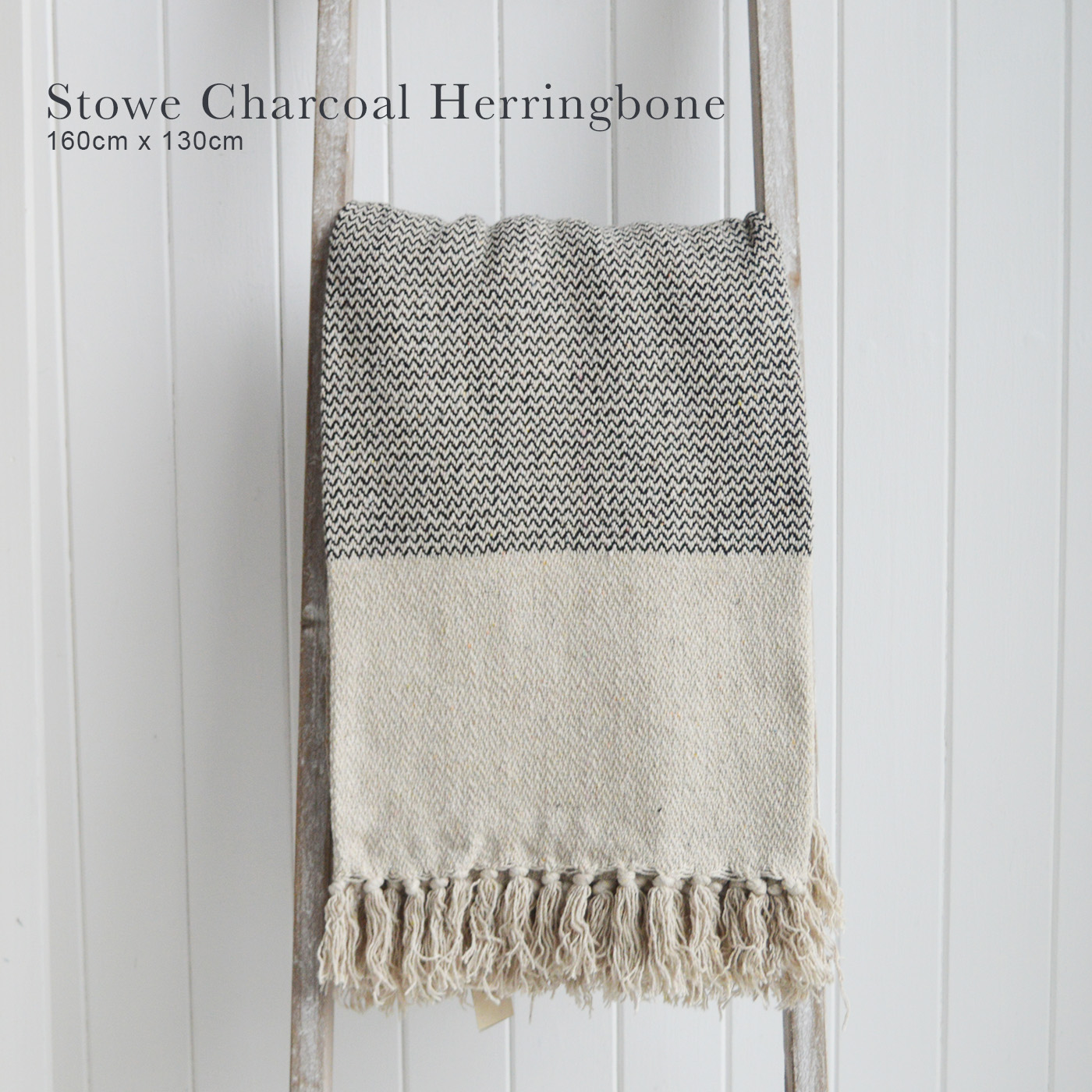 Stowe throws in blues, greys and natural coloures  for interiors in New England styles modern farmhouse, country, coastal and city homes - Charcoal Herringbone
