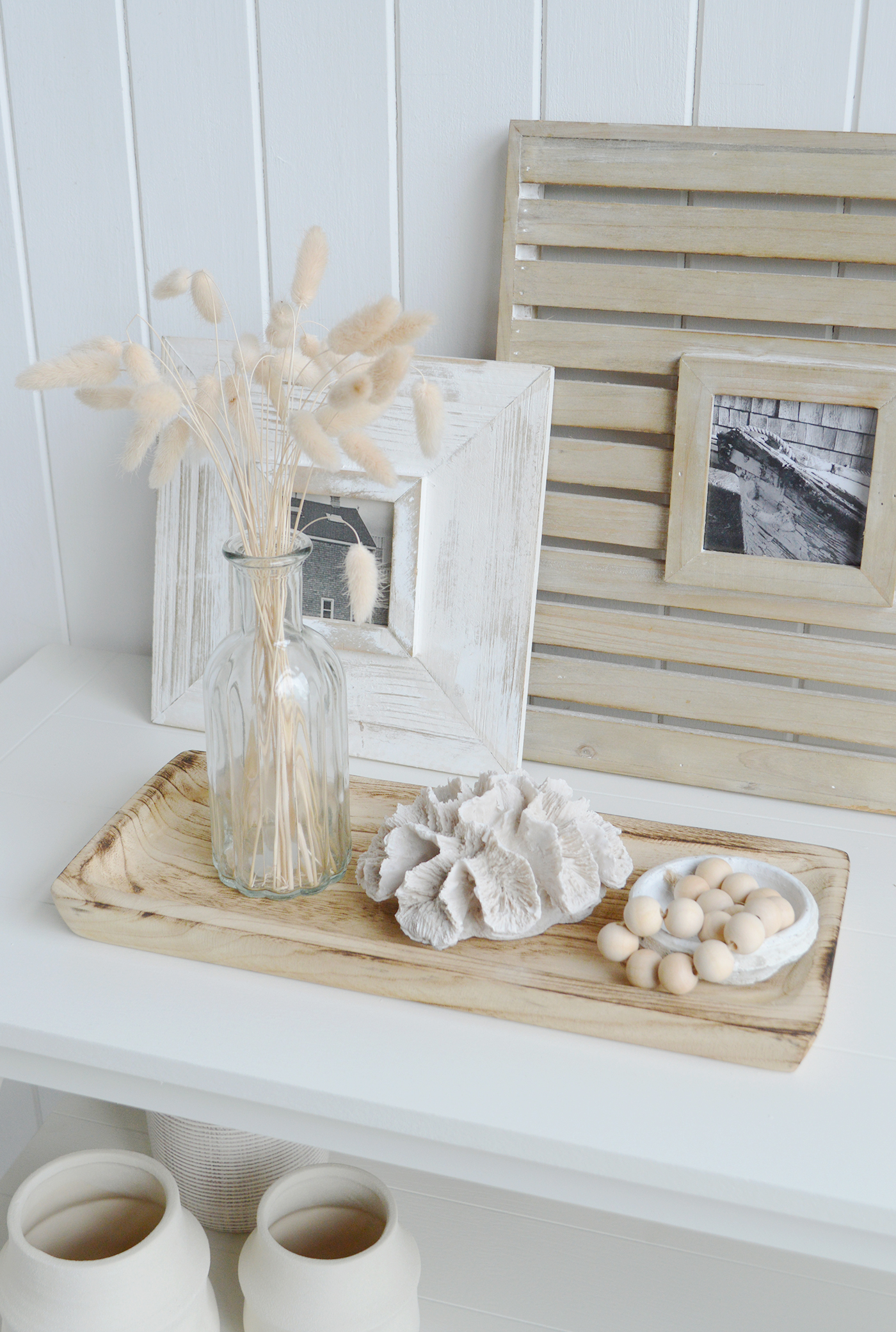 Rectangle wooden display tray for styling consoles and coffee tables on coastal furniture. Chic luxurious Hamptons interiors