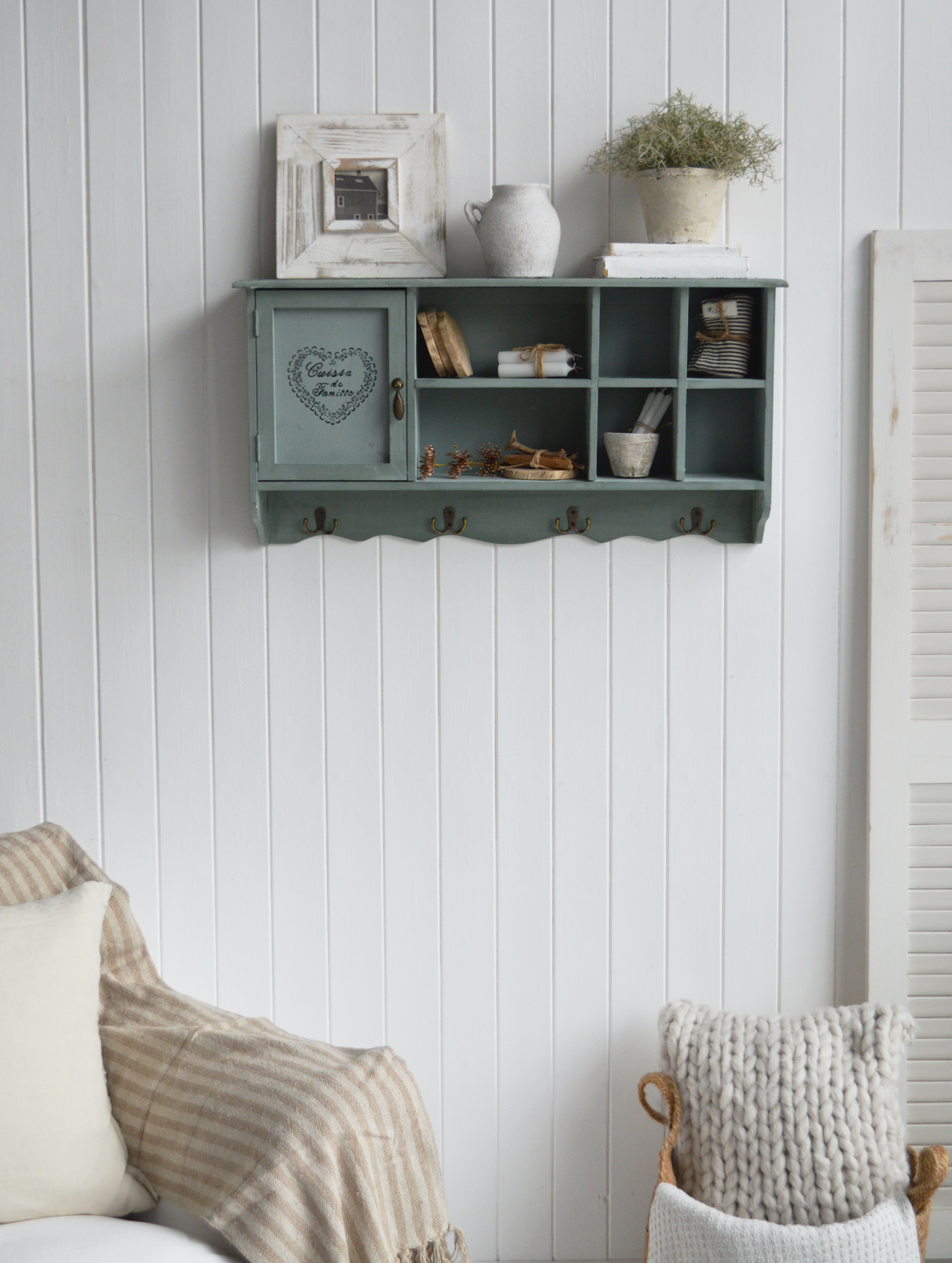 Handcrafted farmhouse furniture and interiors cabinet featuring open shelving, antique-style details, and weathered Farmhouse Sage paint