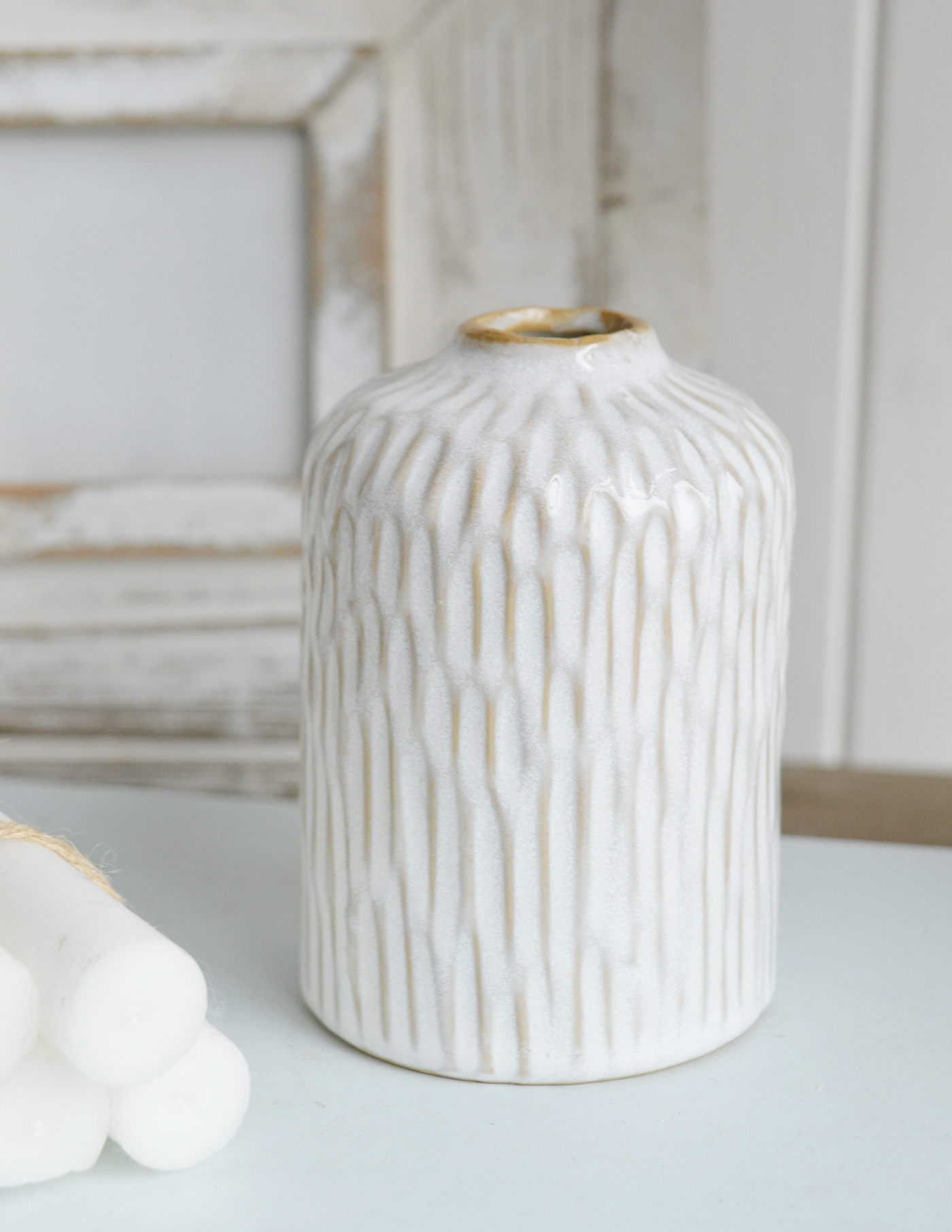 Perfect for a farmhouse-style home, the Charlotte vase’s organic design adds warmth and charm when displayed with fresh or dried blooms