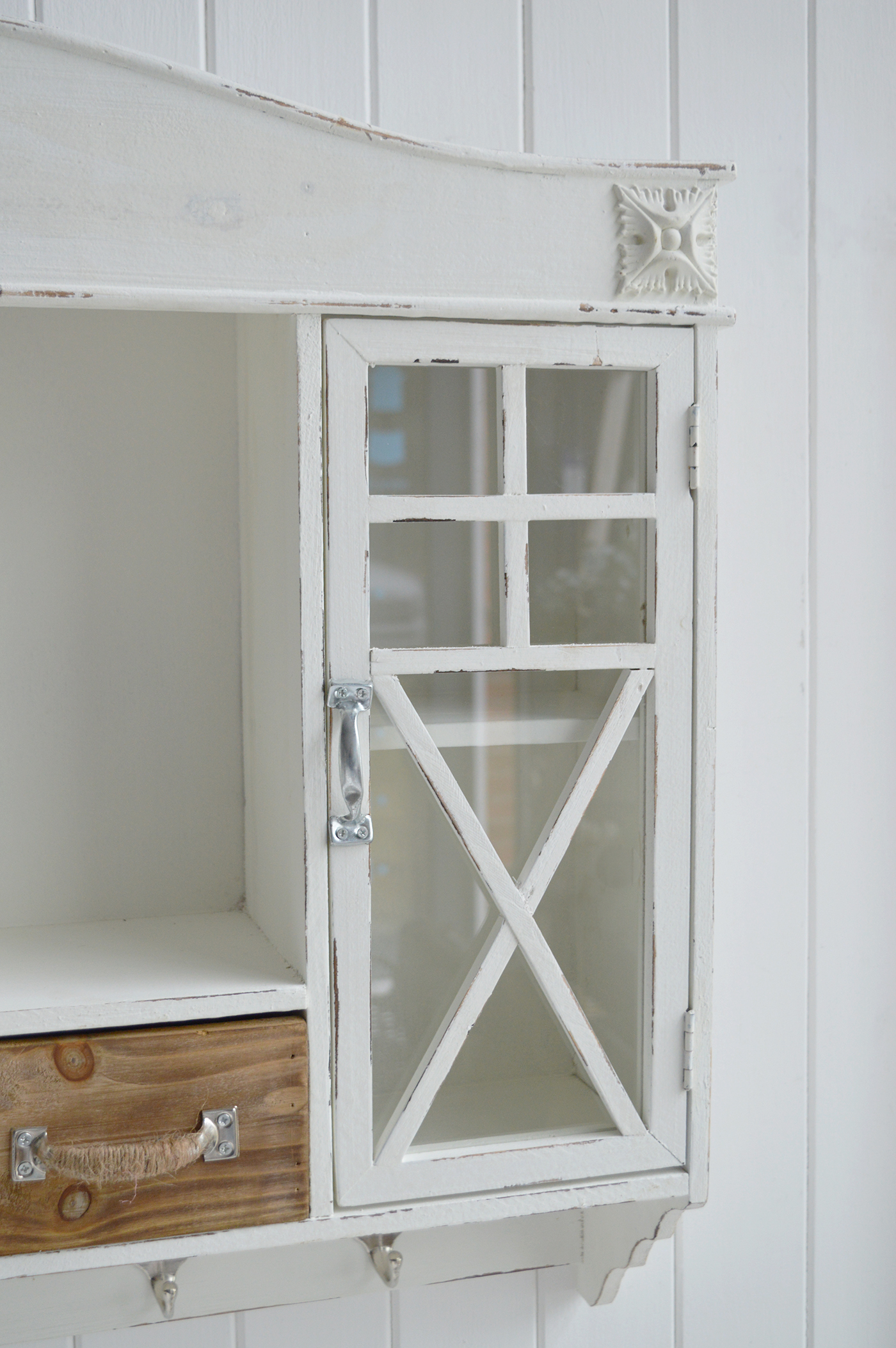 distressed off-white cabinet with farmhouse glass pane doors