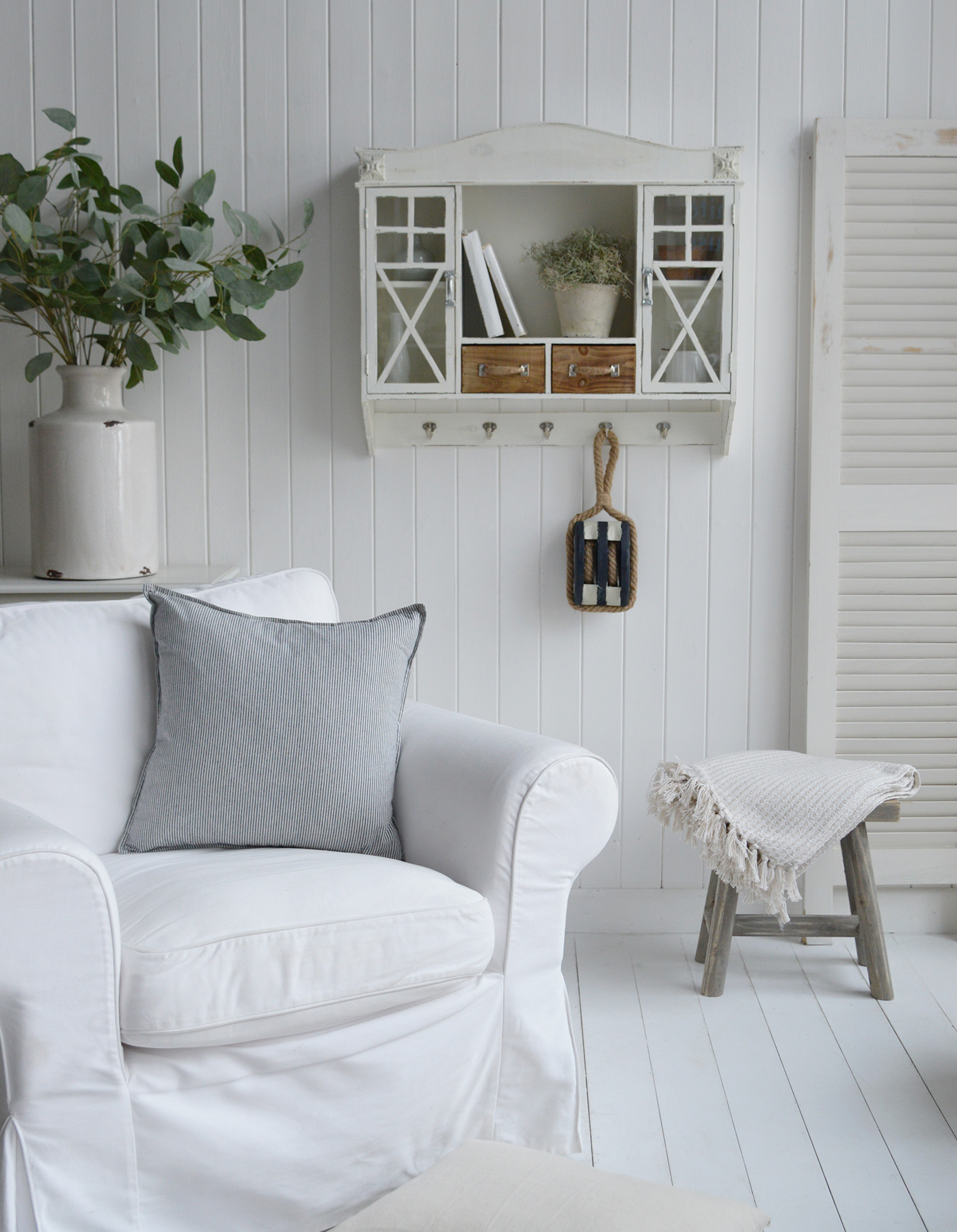 Authentic maritime-inspired pulley styled in navy and white for coastal interiors