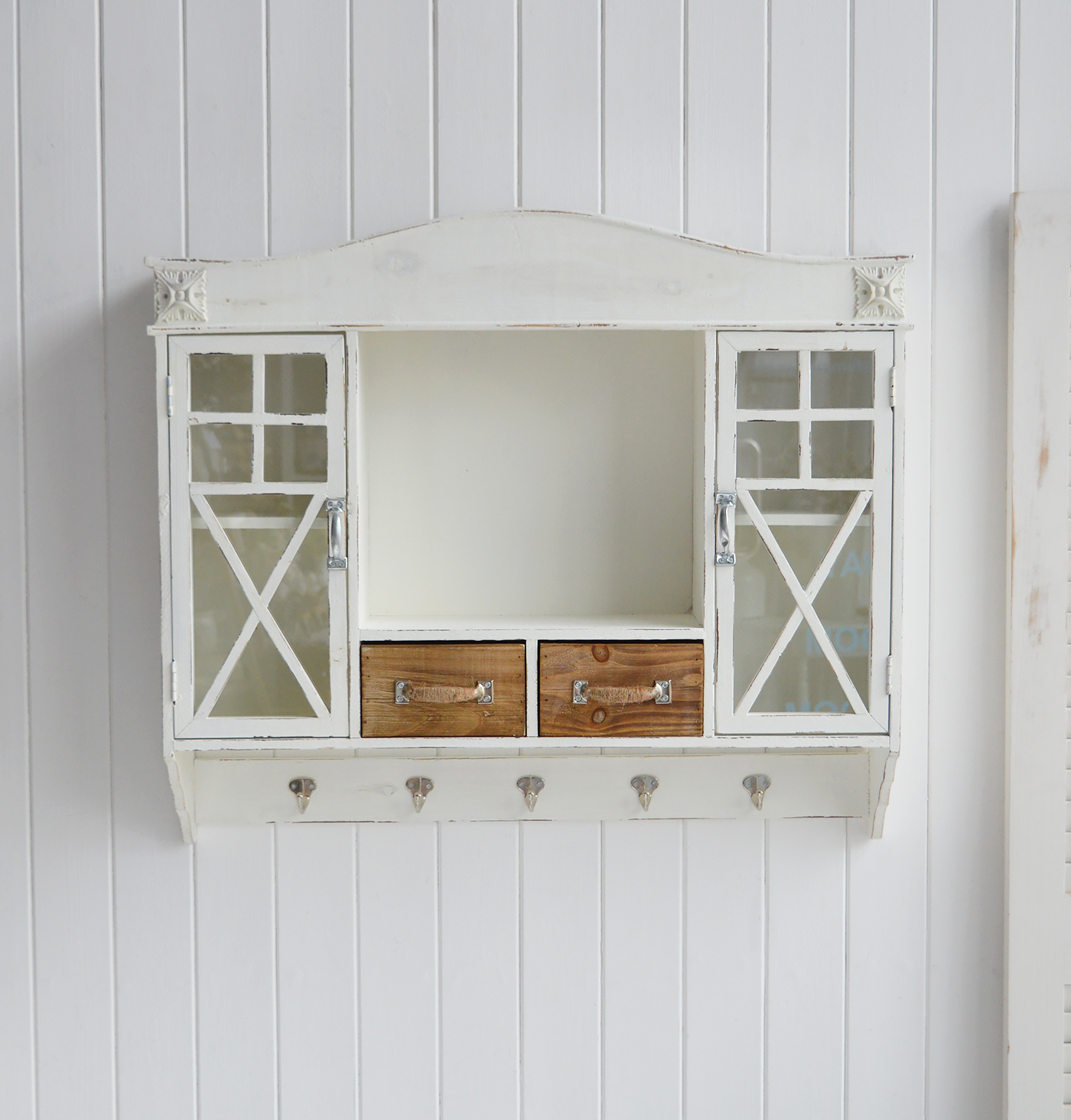 rustic seaside inspired cabinet with glass doors and hooks