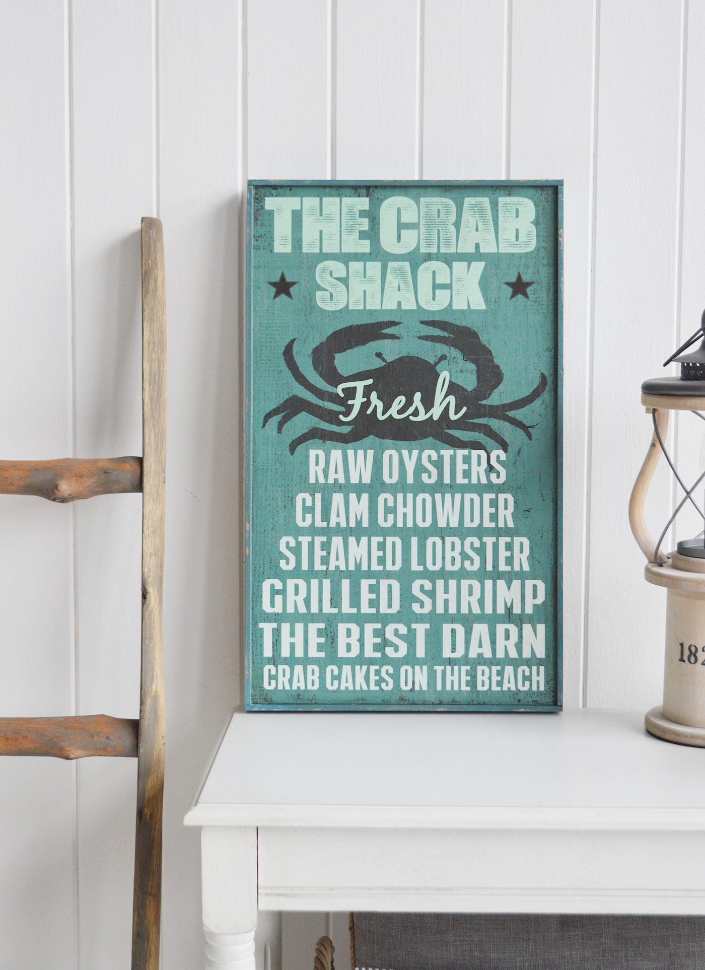 Nautical New England Coastal  Furniture and accessories for the home. A quirky, colourful Crab Shack New England sign typical for restaurants in the coastal areas the White Lighthouse Furniture and Home interiors