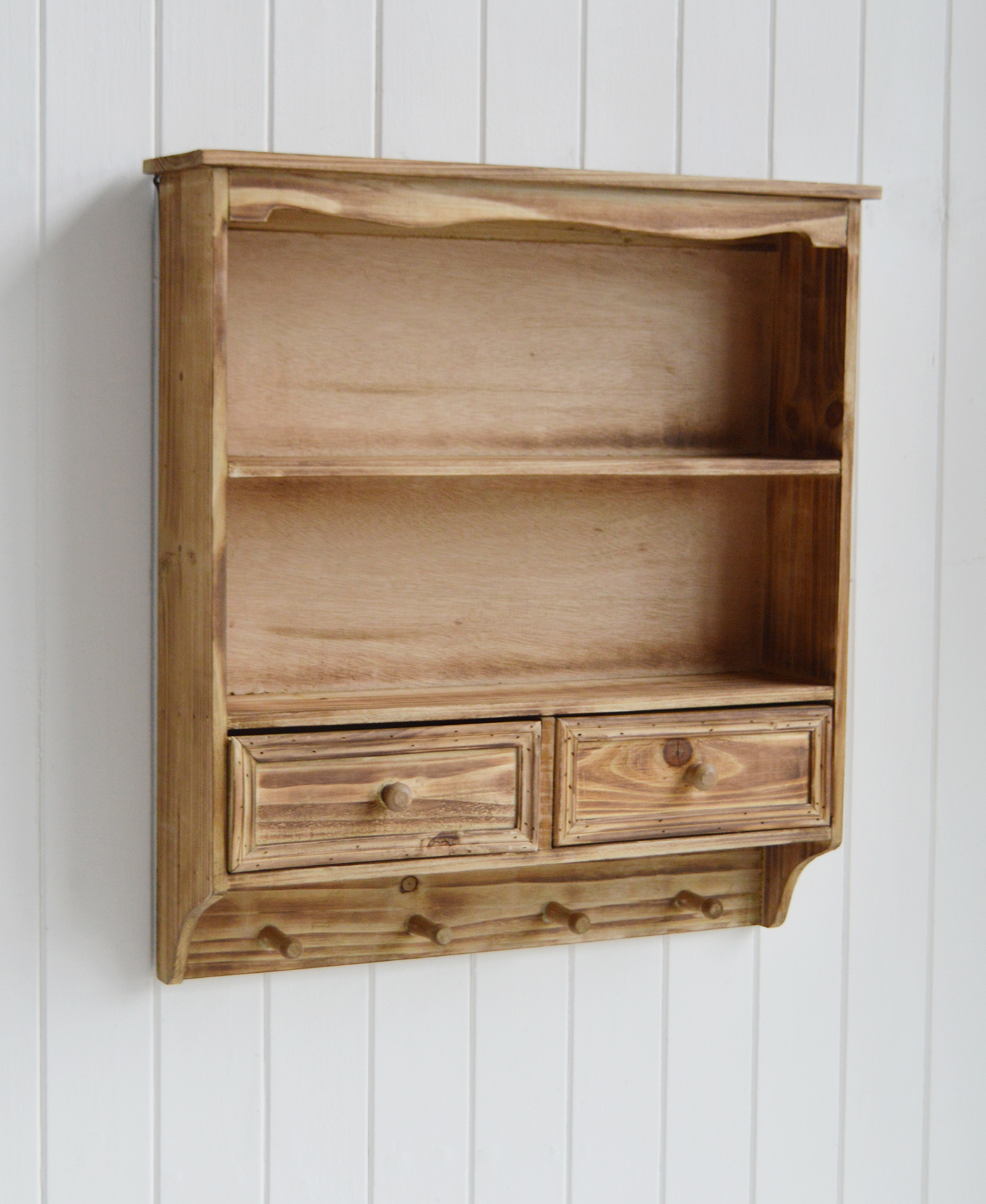 Handcrafted wooden wall shelf for farmhouse kitchens or entryways, blending storage with rustic style.