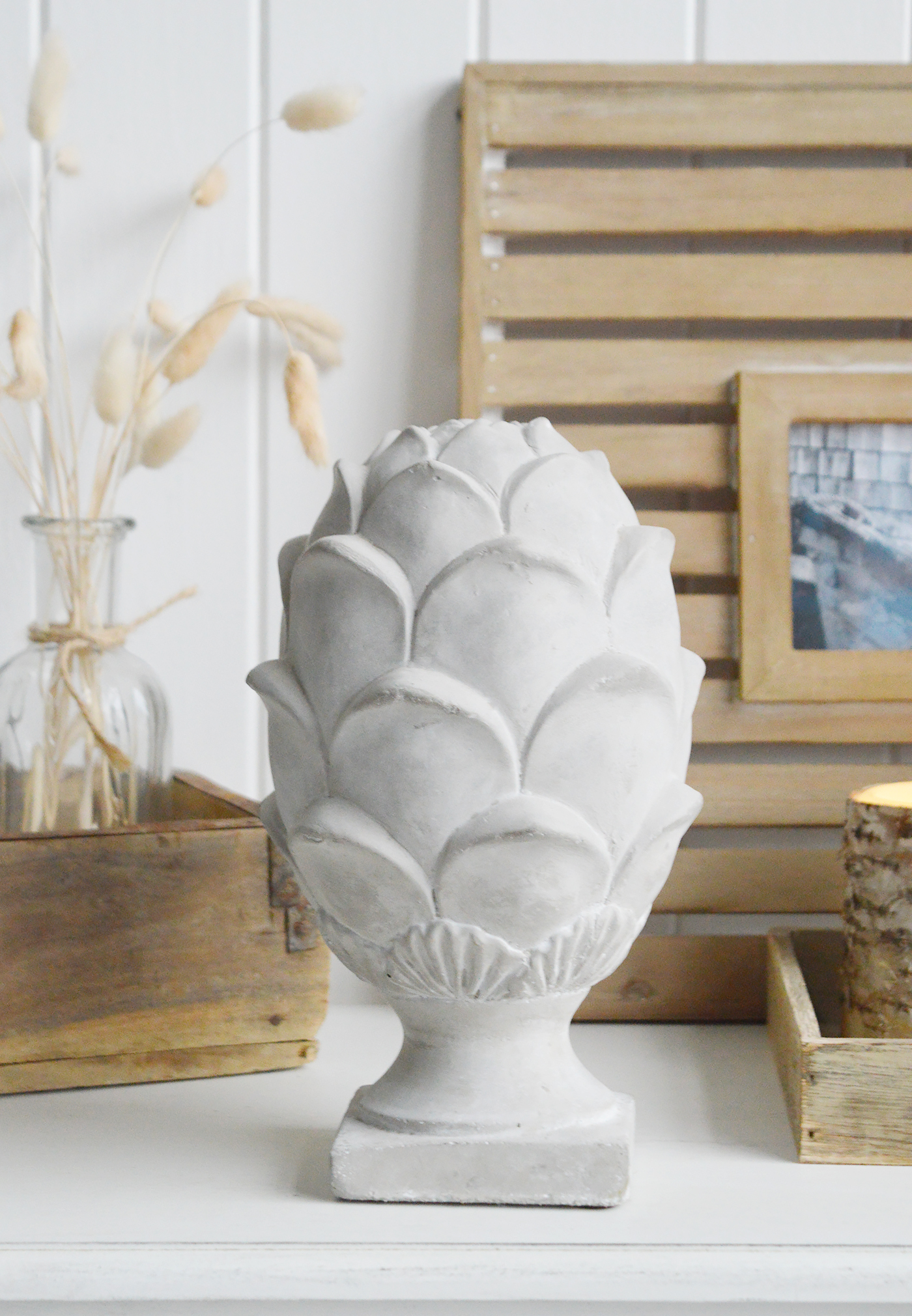 Decorative large grey stone artichoke from The White Lighthouse New England country and coastal furniture and accessories for homes and interiors in UK