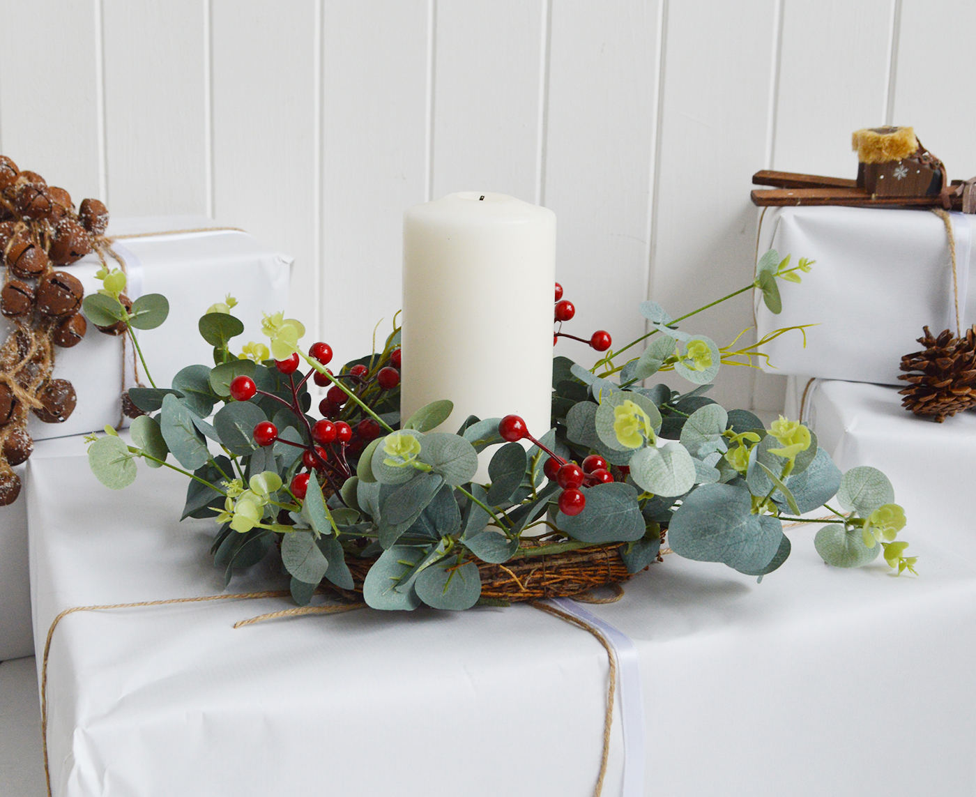 Faux red berries Eucalyptus wreath  with white surroundings