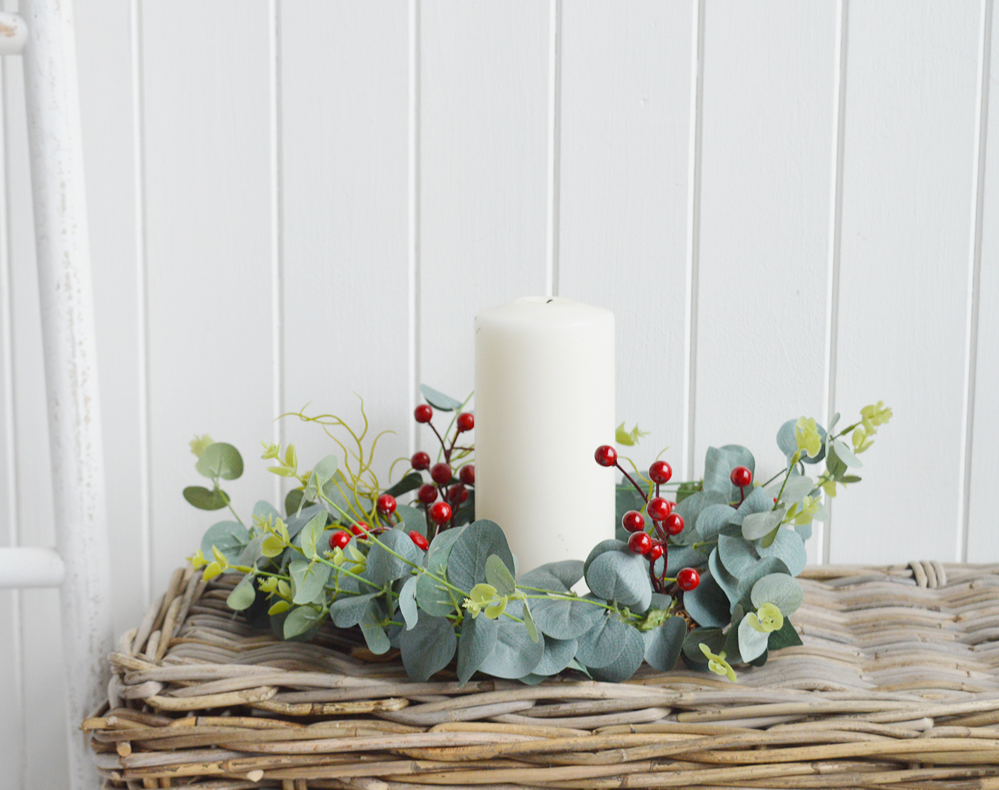 Faux red berries Eucalyptus wreath as a candle ring