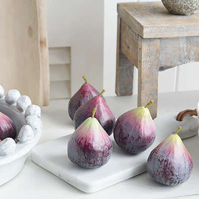 A very realistic decorative fig... Looks stunning in a bowl or dish on the kitchen countertop
