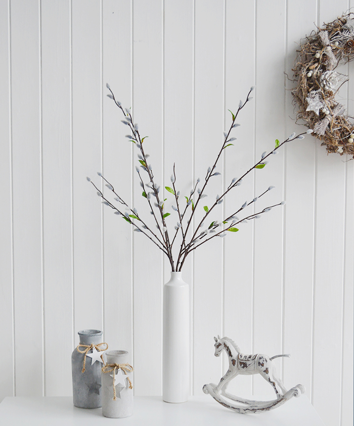 Three artificial Grey Pussy Willow Brances in a tall white vase