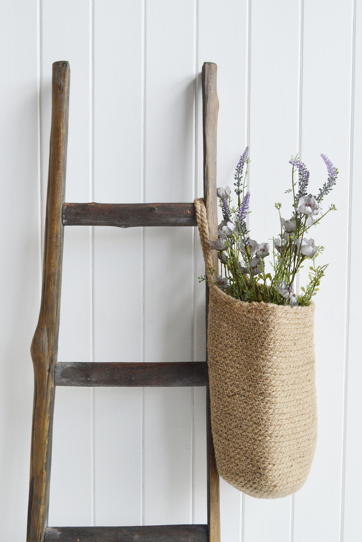 Campton basket filled with wild blue rose for pretty New England interiors