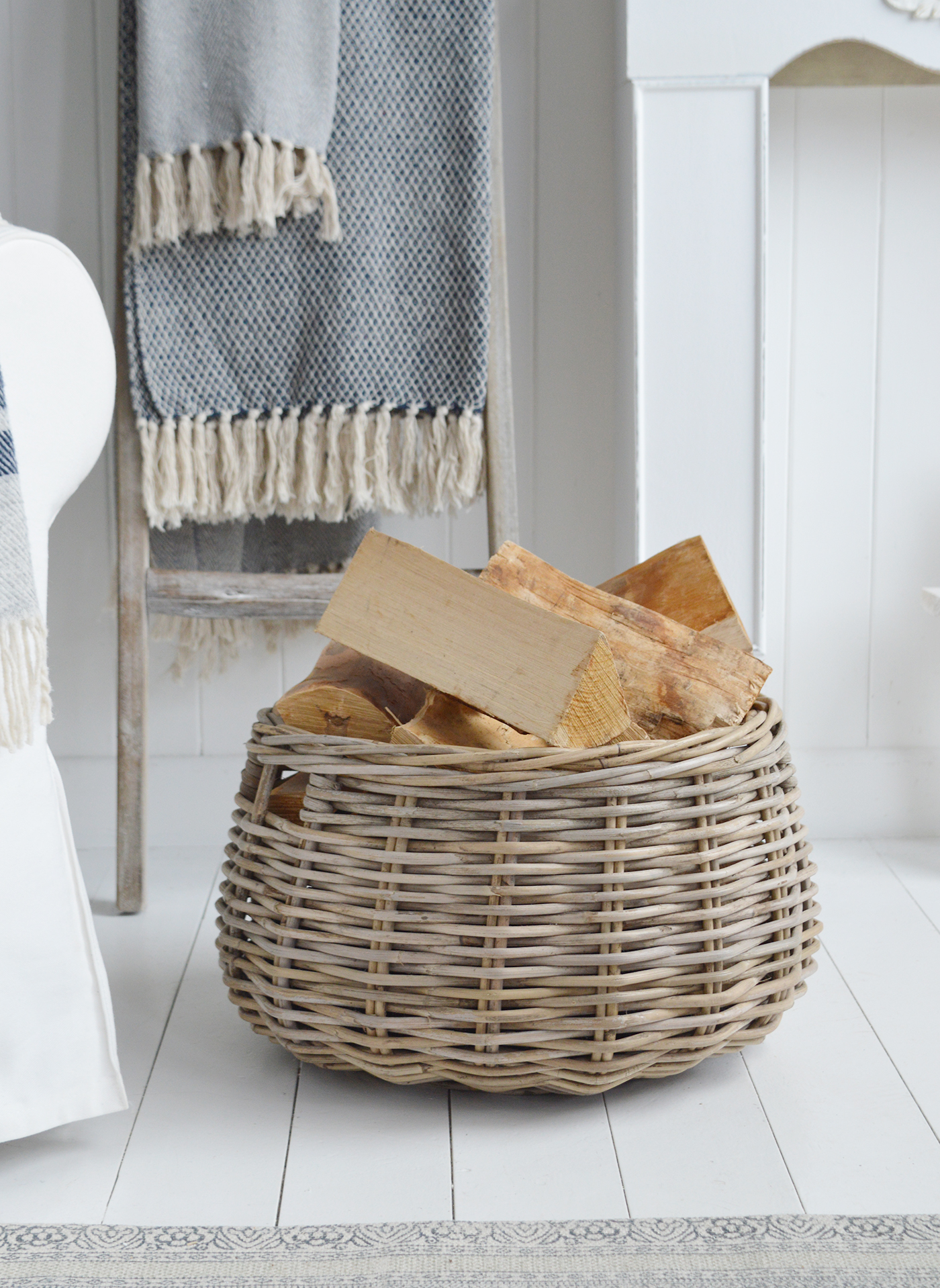 Casco Bay round logs basket. Cosy New England style furniture and home interiors