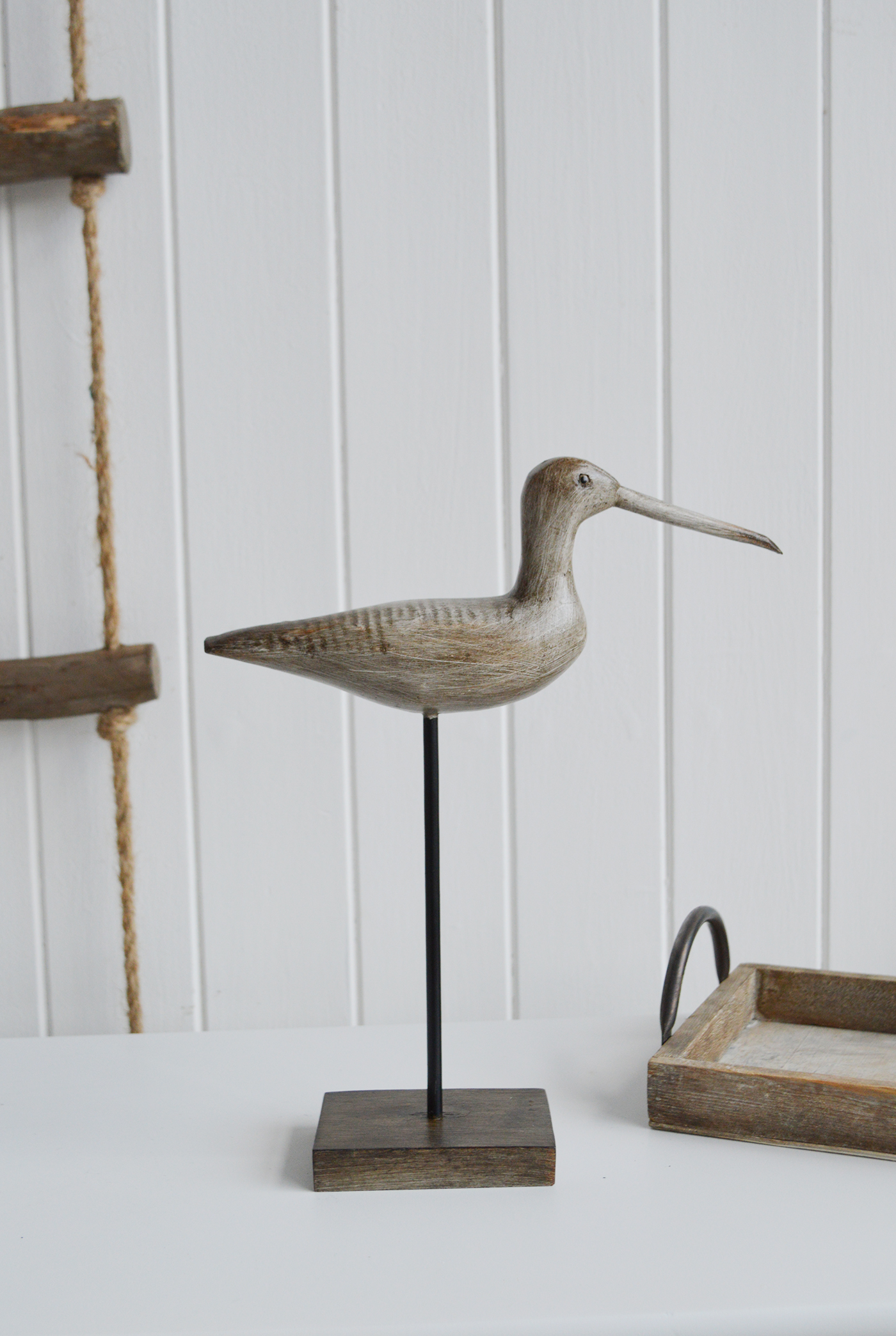 Nautical New England Coastal  Furniture and accessories for the home. A decorative standing seabird from the White Lighthouse Furniture and Home interiors