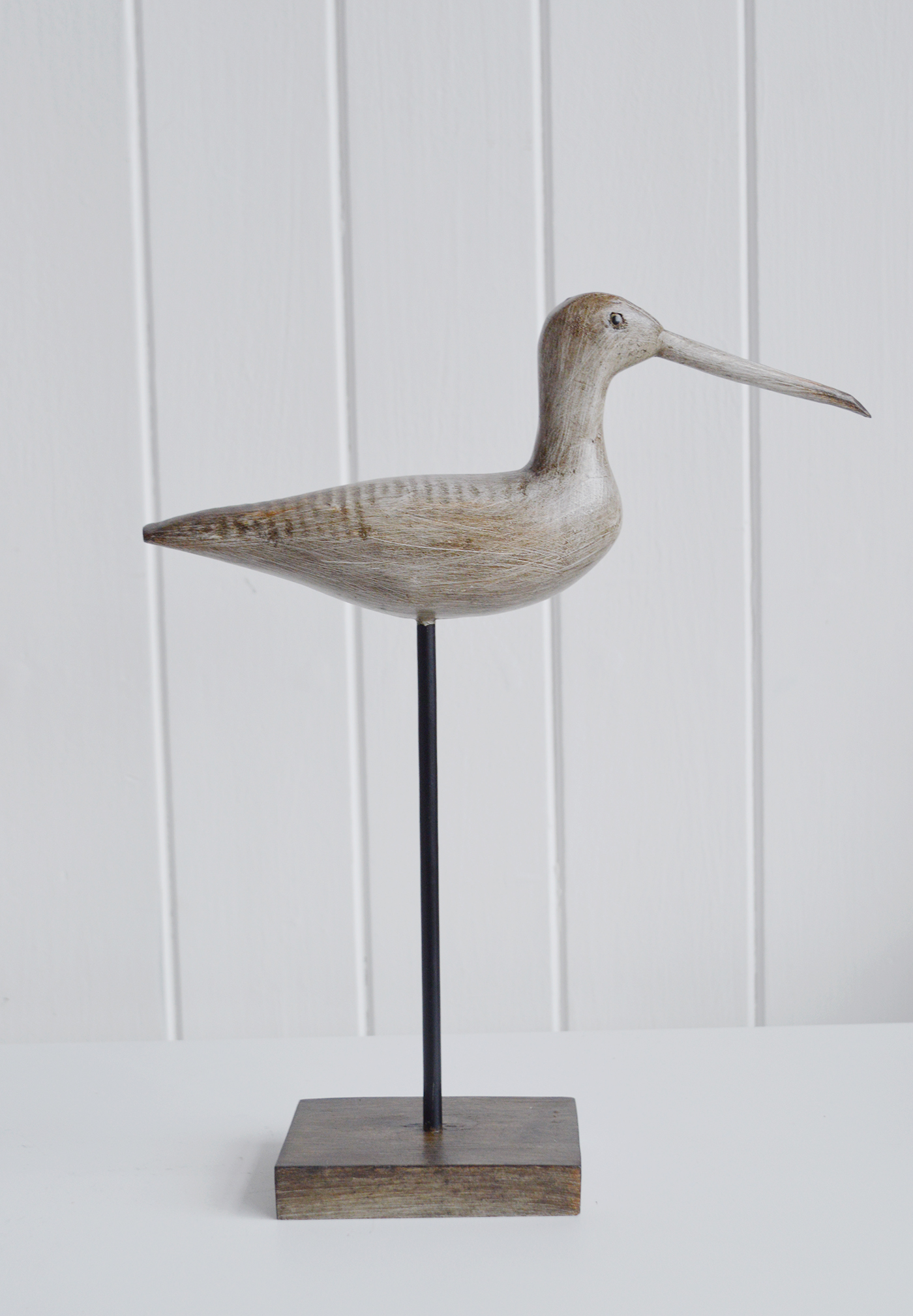 Nautical New England Coastal  Furniture and accessories for the home. A decorative standing seabird from the White Lighthouse Furniture and Home interiors