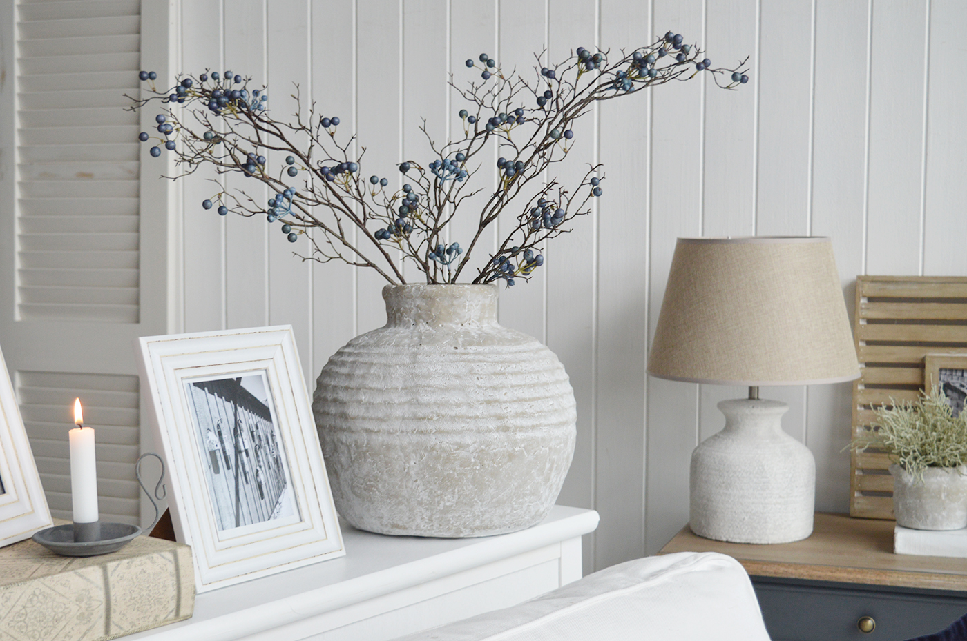 Faux blue berries branch in the Newfane rustic stone jug for modern country, coastal and farmhouse homes andinteriorsw