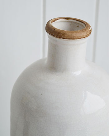 Shows glaze of white stoneware bottle