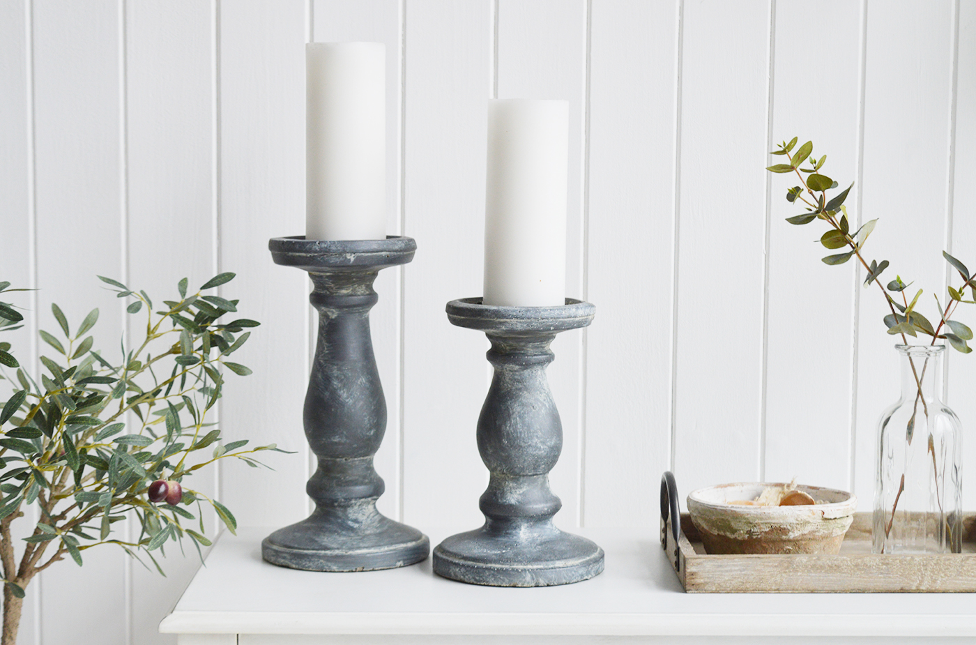 The Brockton is a classic style tall candle holder in aged metal finish. A timeless candlestick that is stunning as a pair or singly on a table or mantle in the hallway living room or as a centre piece on the dining table