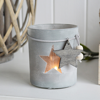 Our grey etched glass candle holder with star and hanging wooden star

The range of candle holders in grey and white are a perfect accompaniment to our New England, country and coastal furniture for your bedroom, living room, hall and bathroom.